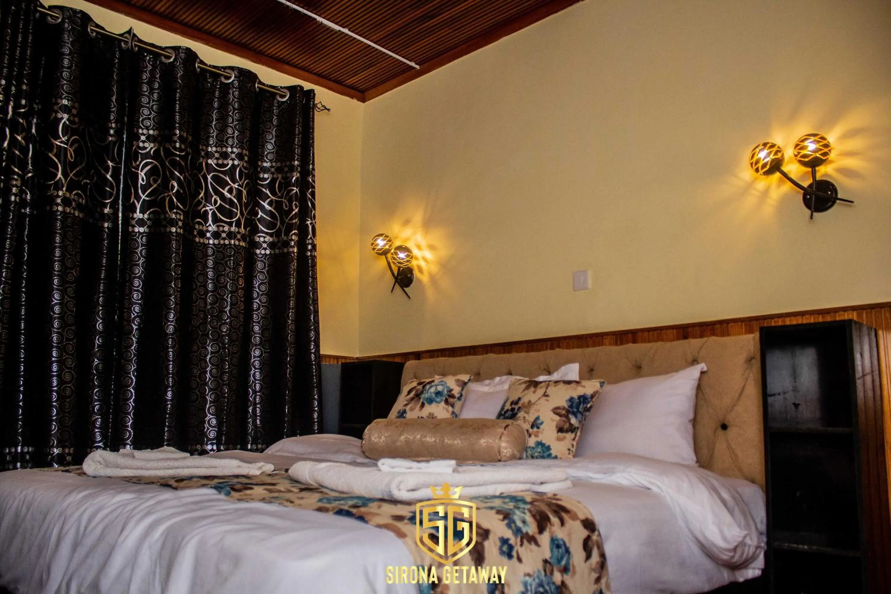 Bed in Sirona Getaway Hotel