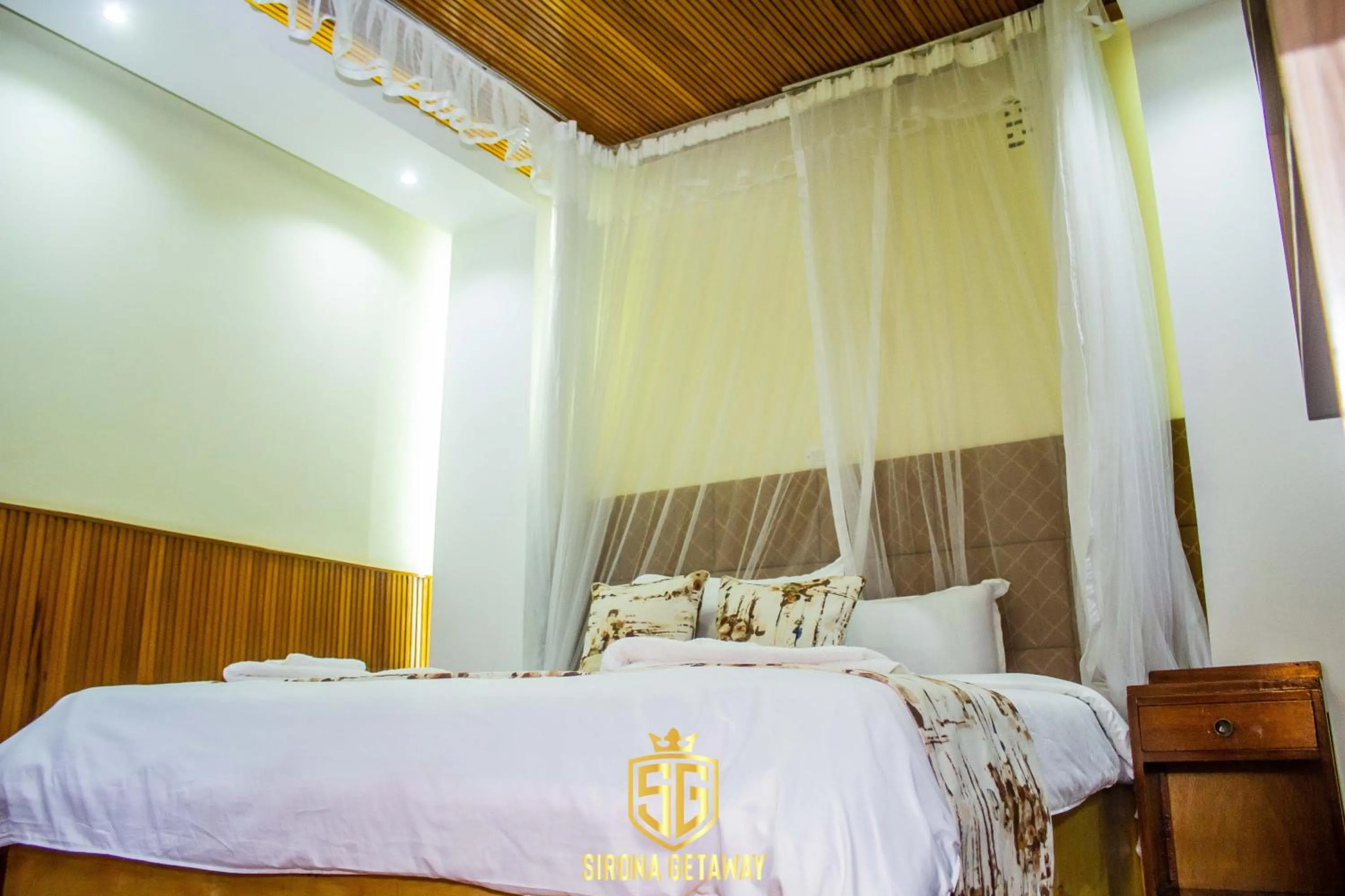 Bed in Sirona Getaway Hotel