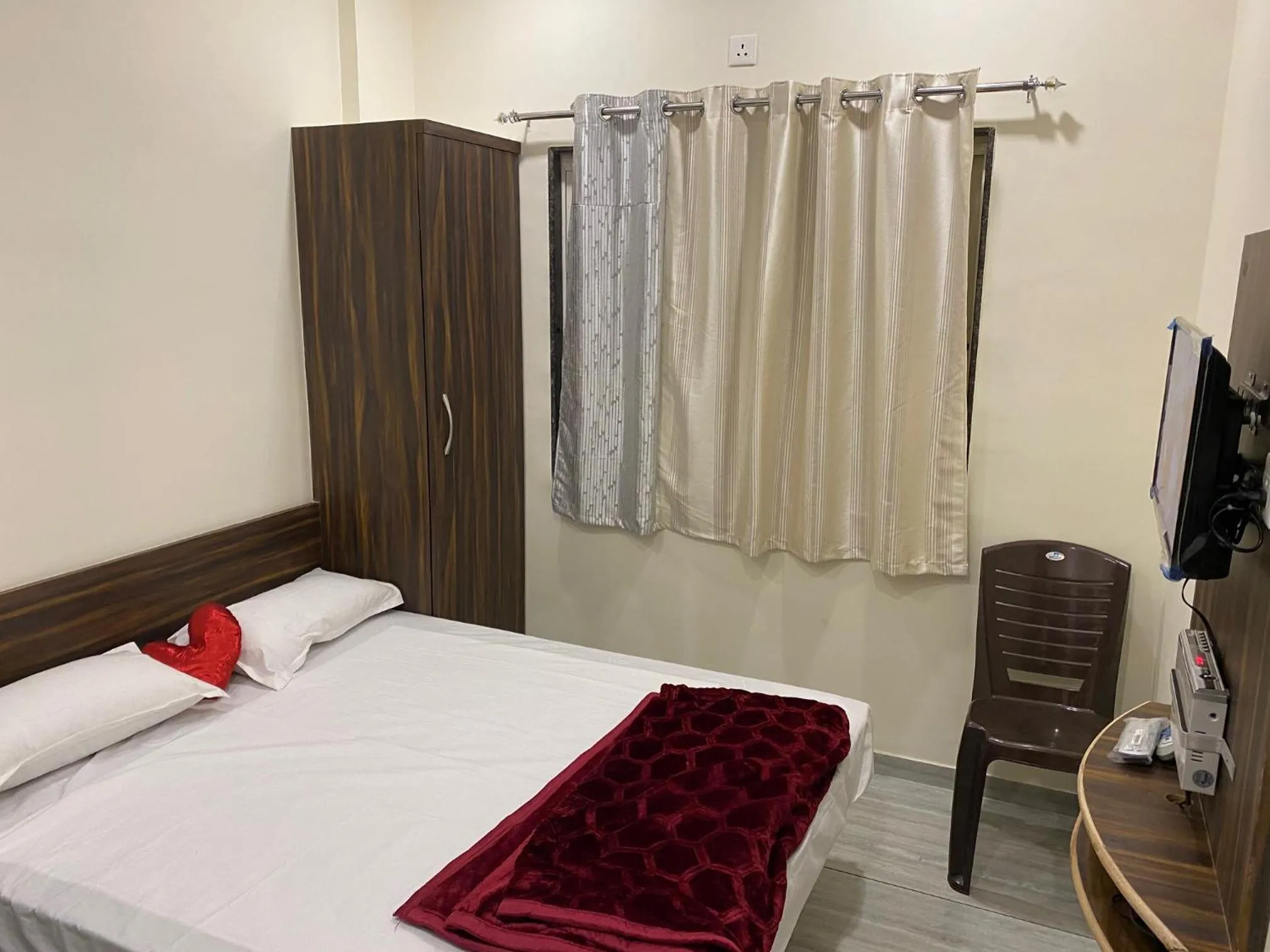 Photo of the whole room, Bed in Galaxy Residency, Panchgani - MTDC Approved