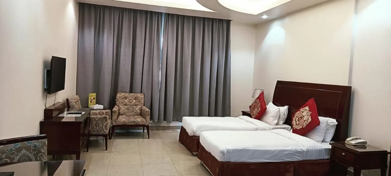 Bed in Clifton International Hotel