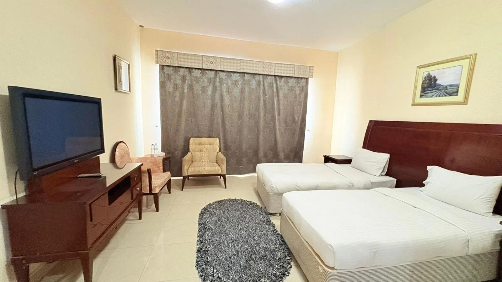 Bed in Clifton International Hotel