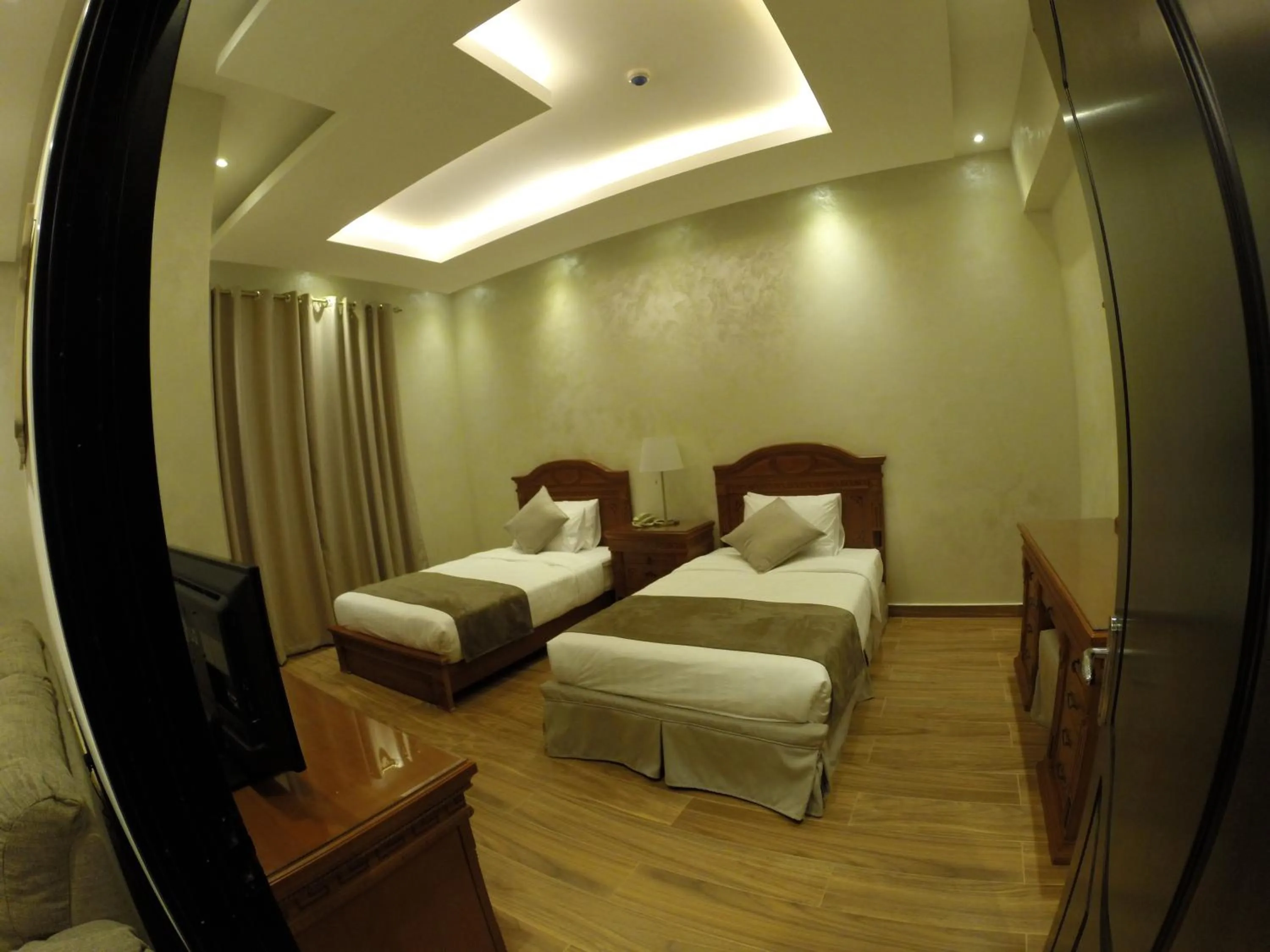 Bed in Le Park Hotel