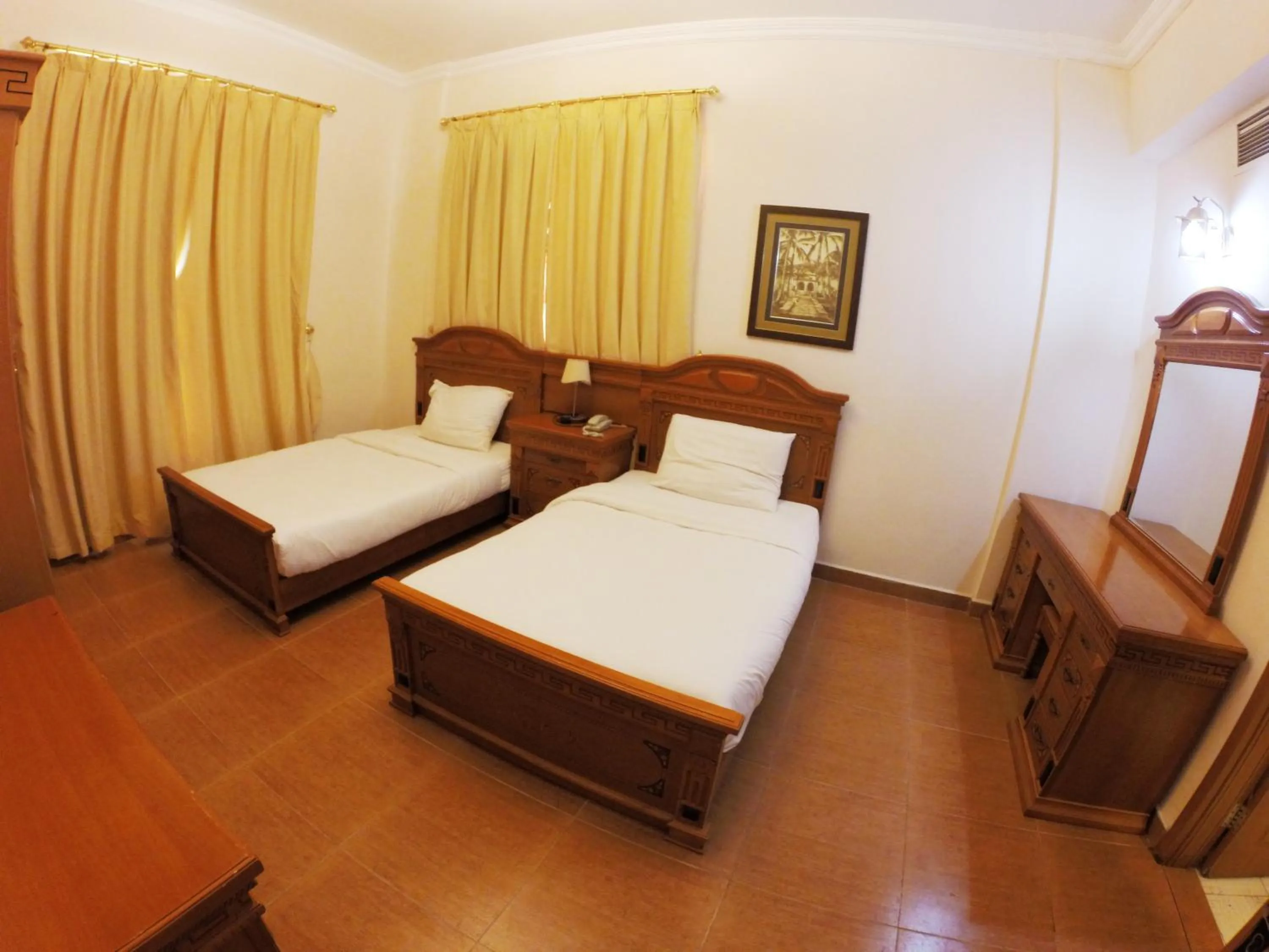 Bed in Le Park Hotel