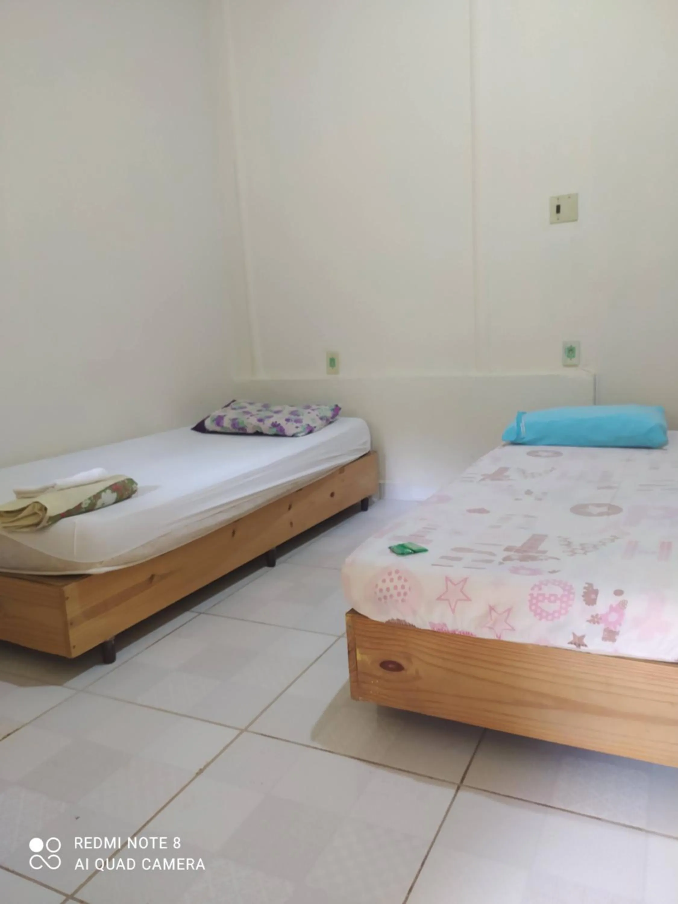 Bed in Pousada do Ribeirão