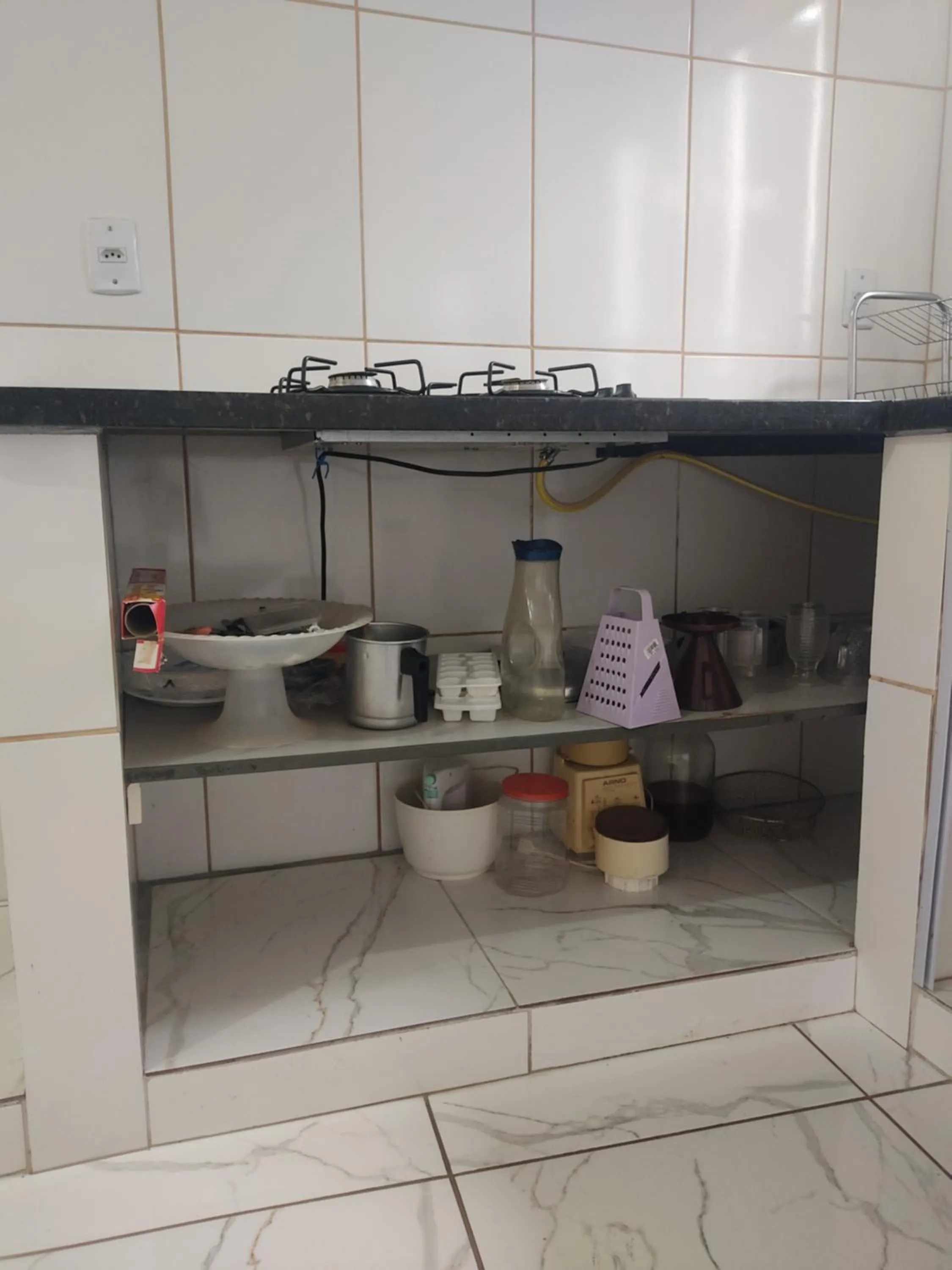 Kitchen or kitchenette in Pousada do Ribeirão