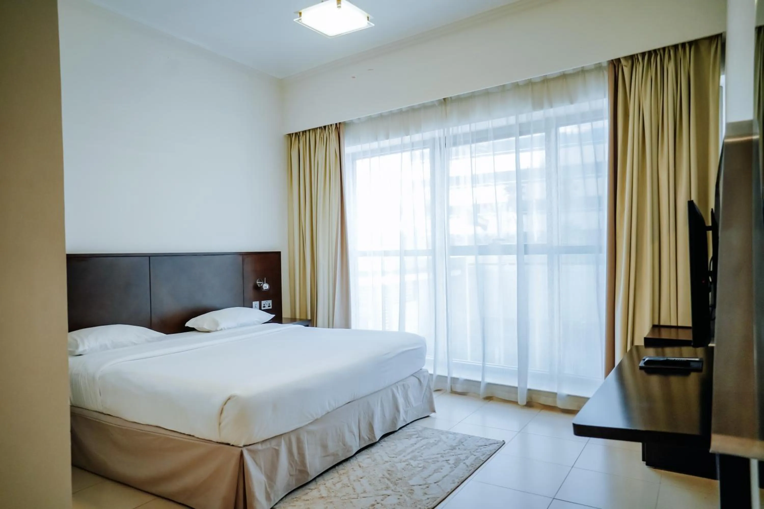 Bedroom, Bed in MENA ApartHotel Albarsha At The Mall