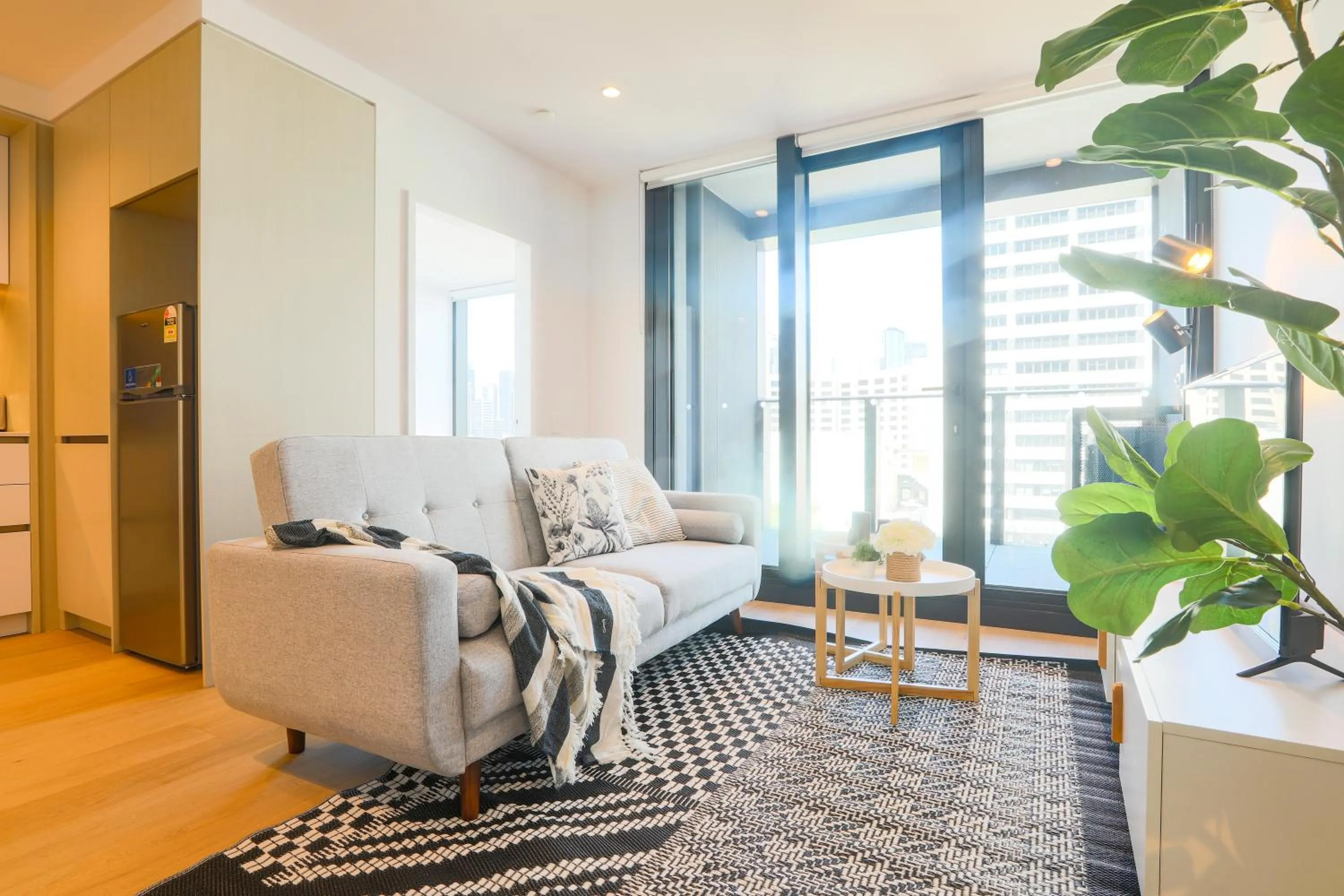 Living room in KOZYGURU DOCKLANDS MODERN COZY 1 BED ROOM UNIT MELBOURNE VDO628