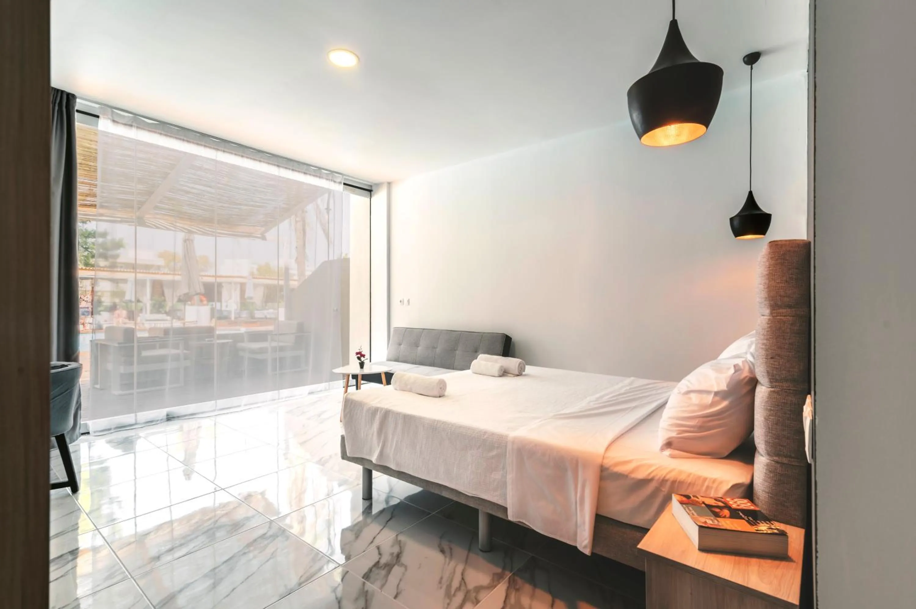 Bed in Bamboo Suites Hotel - Adults Only