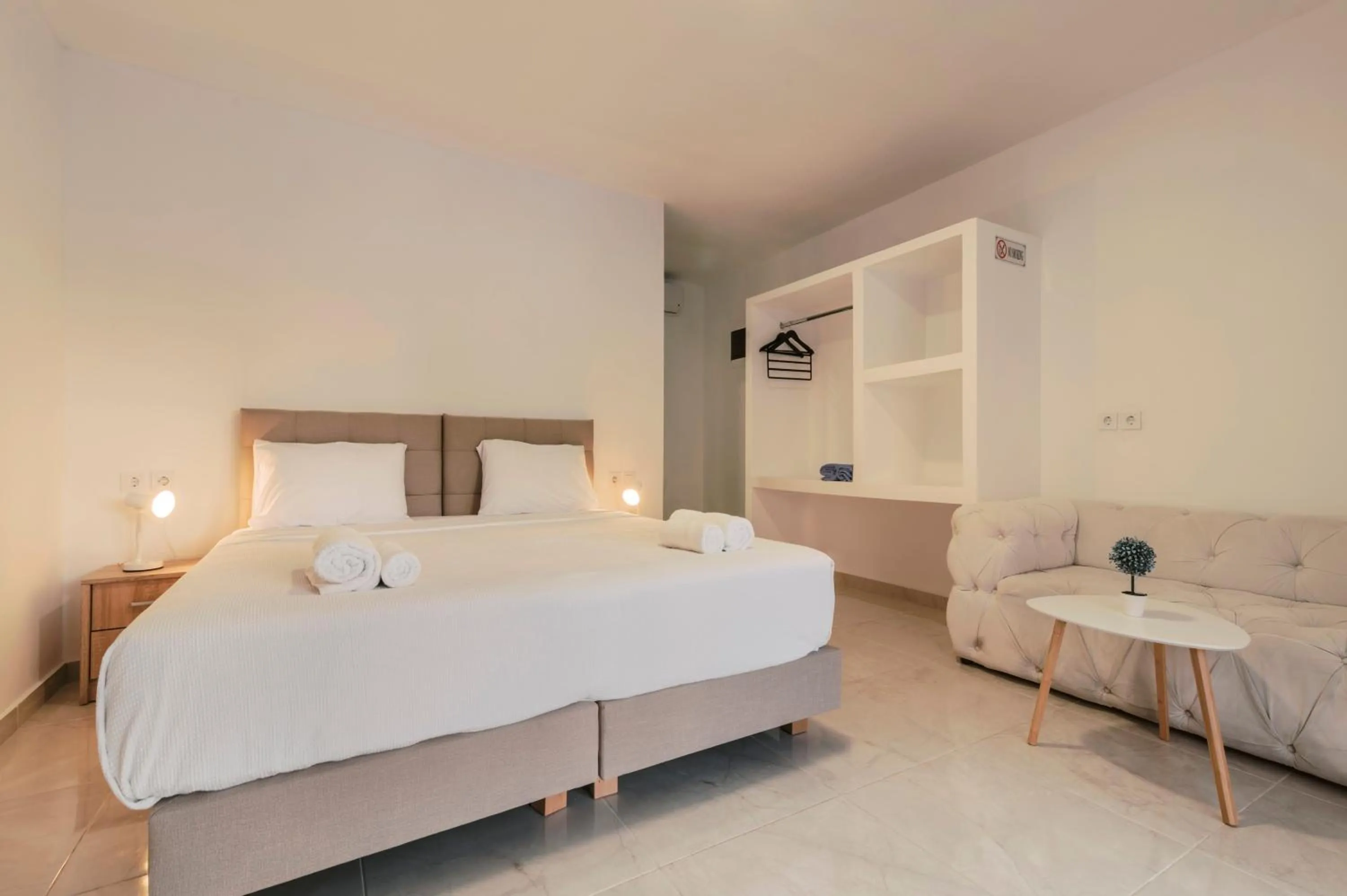 Bed in Bamboo Suites Hotel - Adults Only