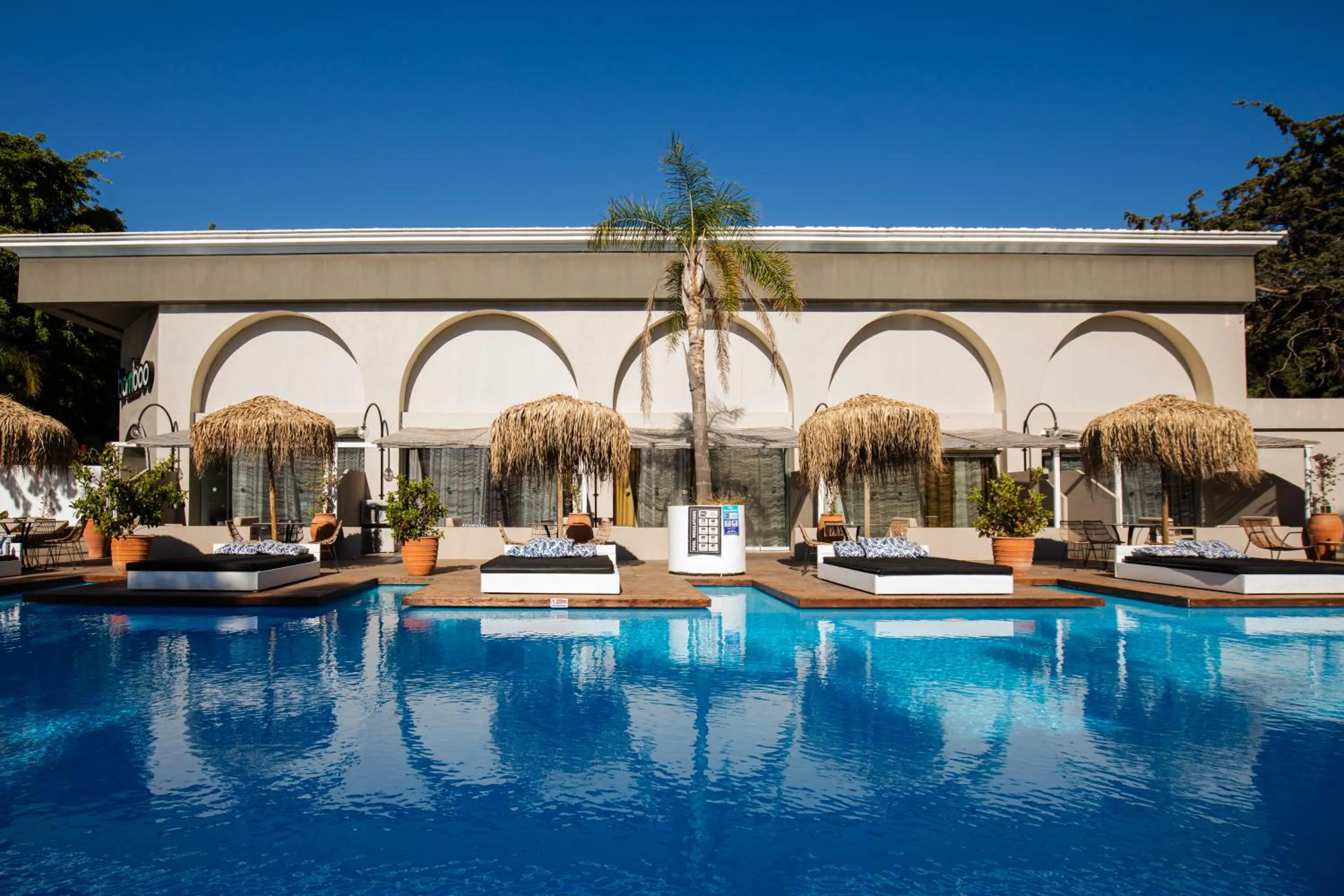 Swimming pool in Bamboo Suites Hotel - Adults Only