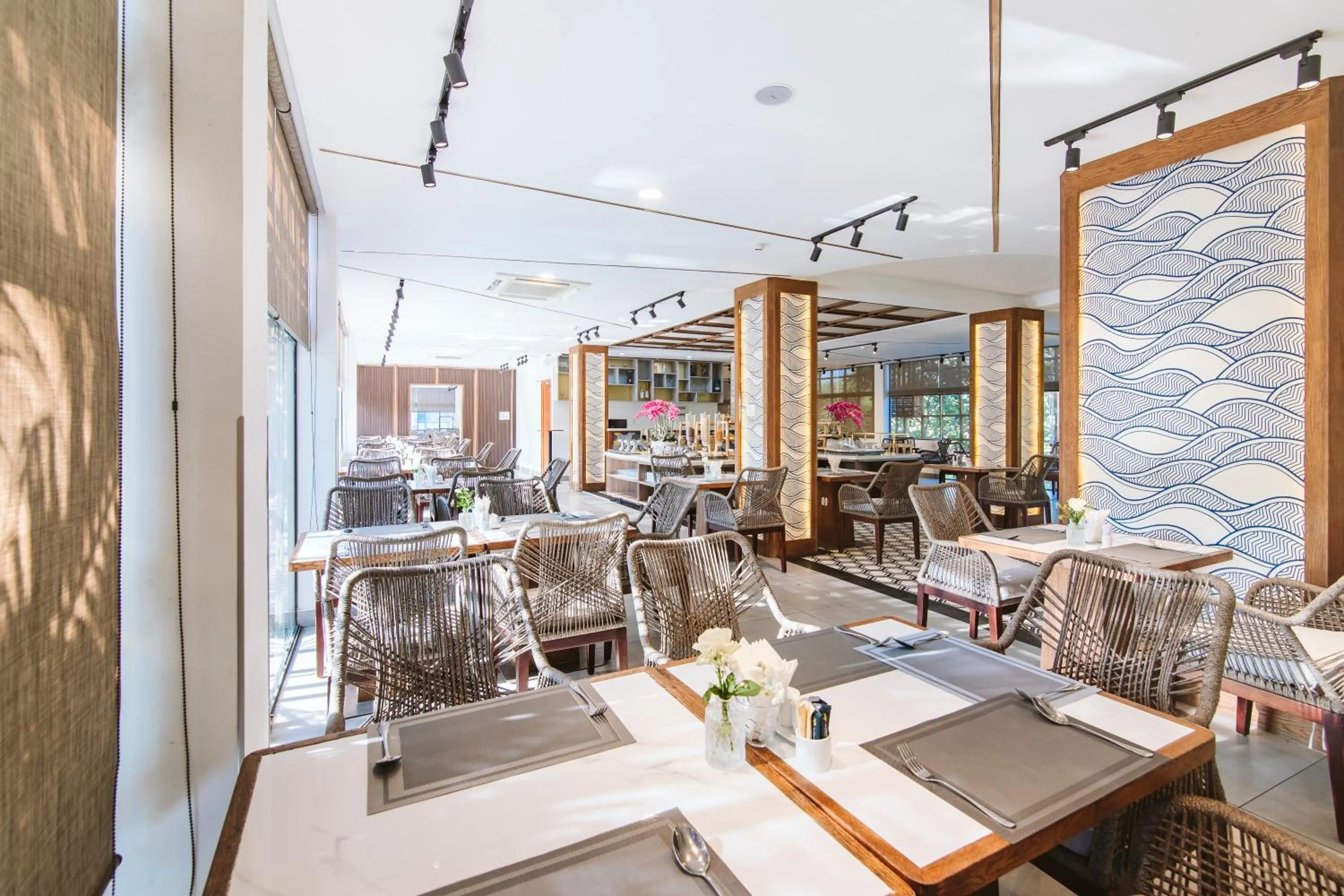 Restaurant/places to eat in Le Palmier Ho Tram Resort - Beachfront with Private Beach