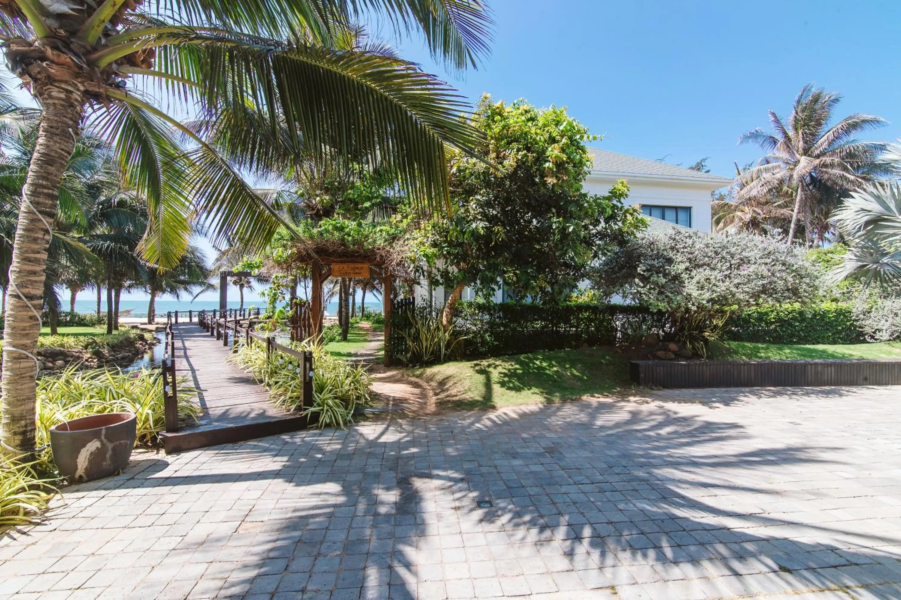 Garden in Le Palmier Ho Tram Resort - Beachfront with Private Beach