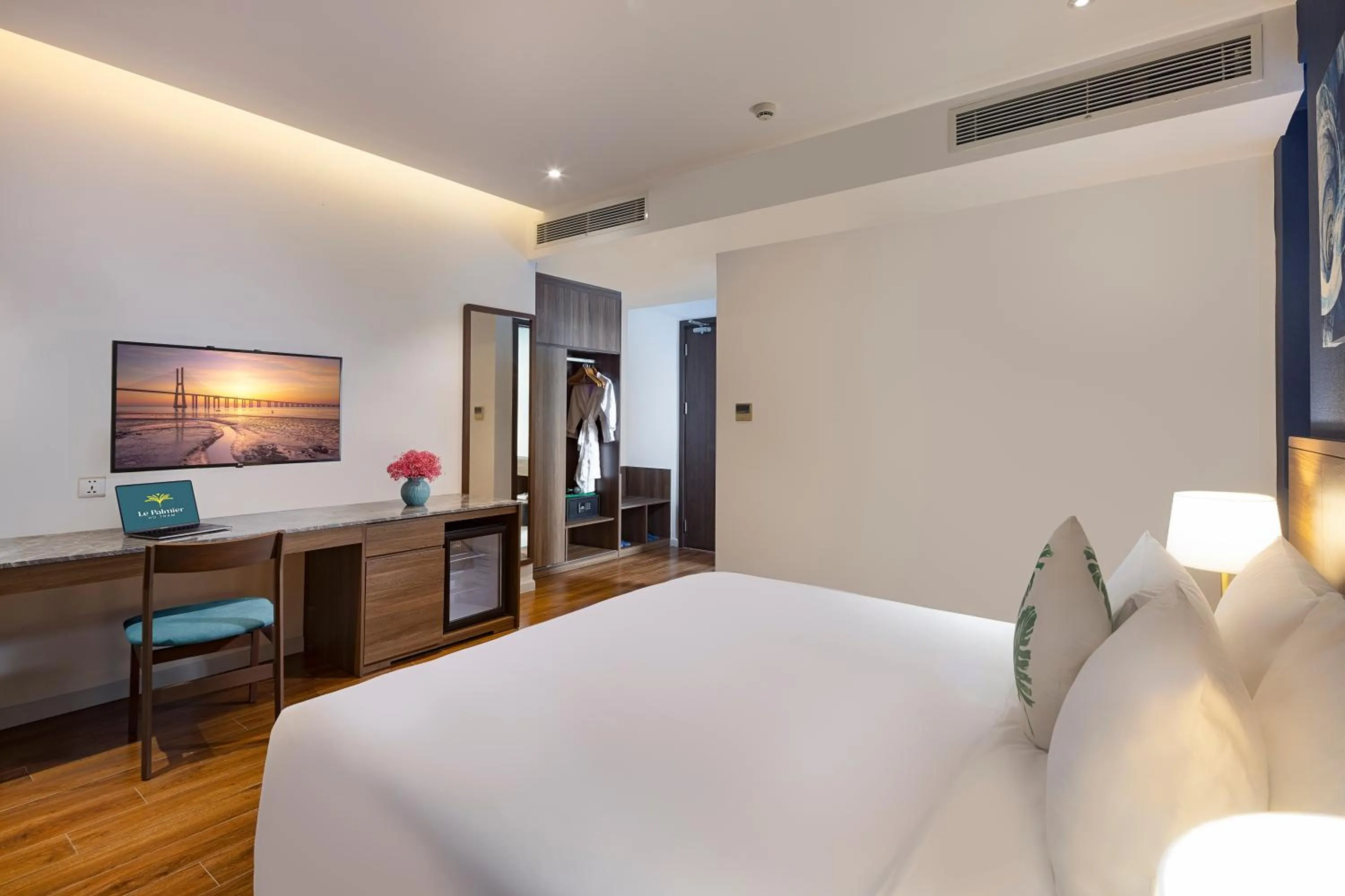 Bedroom, Bed in Le Palmier Ho Tram Resort - Beachfront with Private Beach