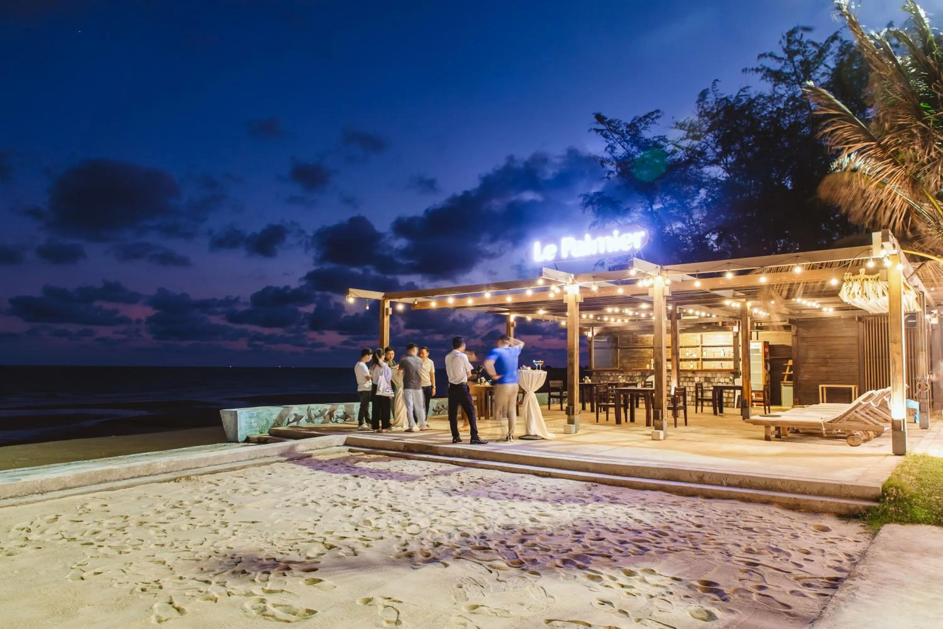 Lounge or bar in Le Palmier Ho Tram Resort - Beachfront with Private Beach