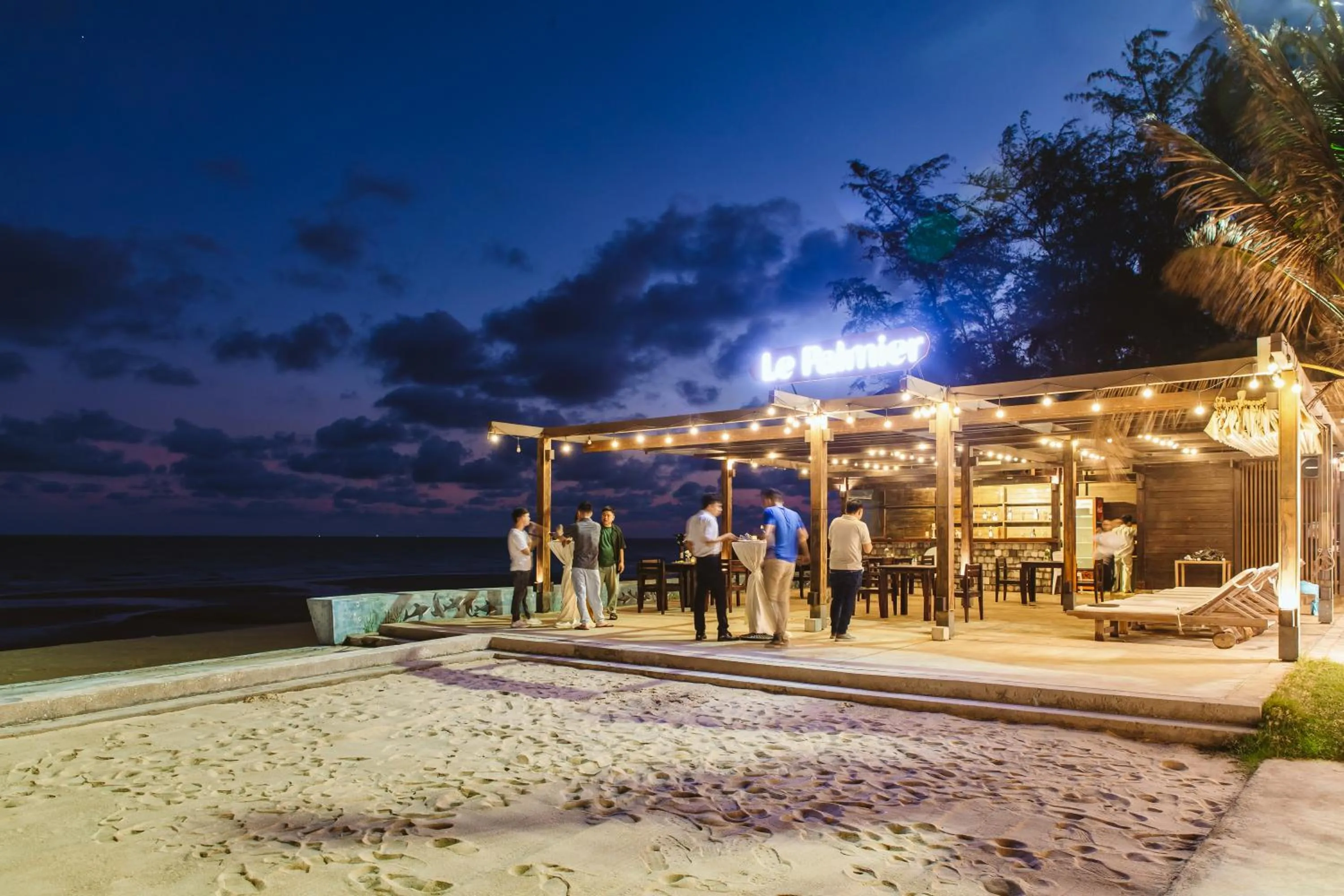 Lounge or bar in Le Palmier Ho Tram Resort - Beachfront with Private Beach