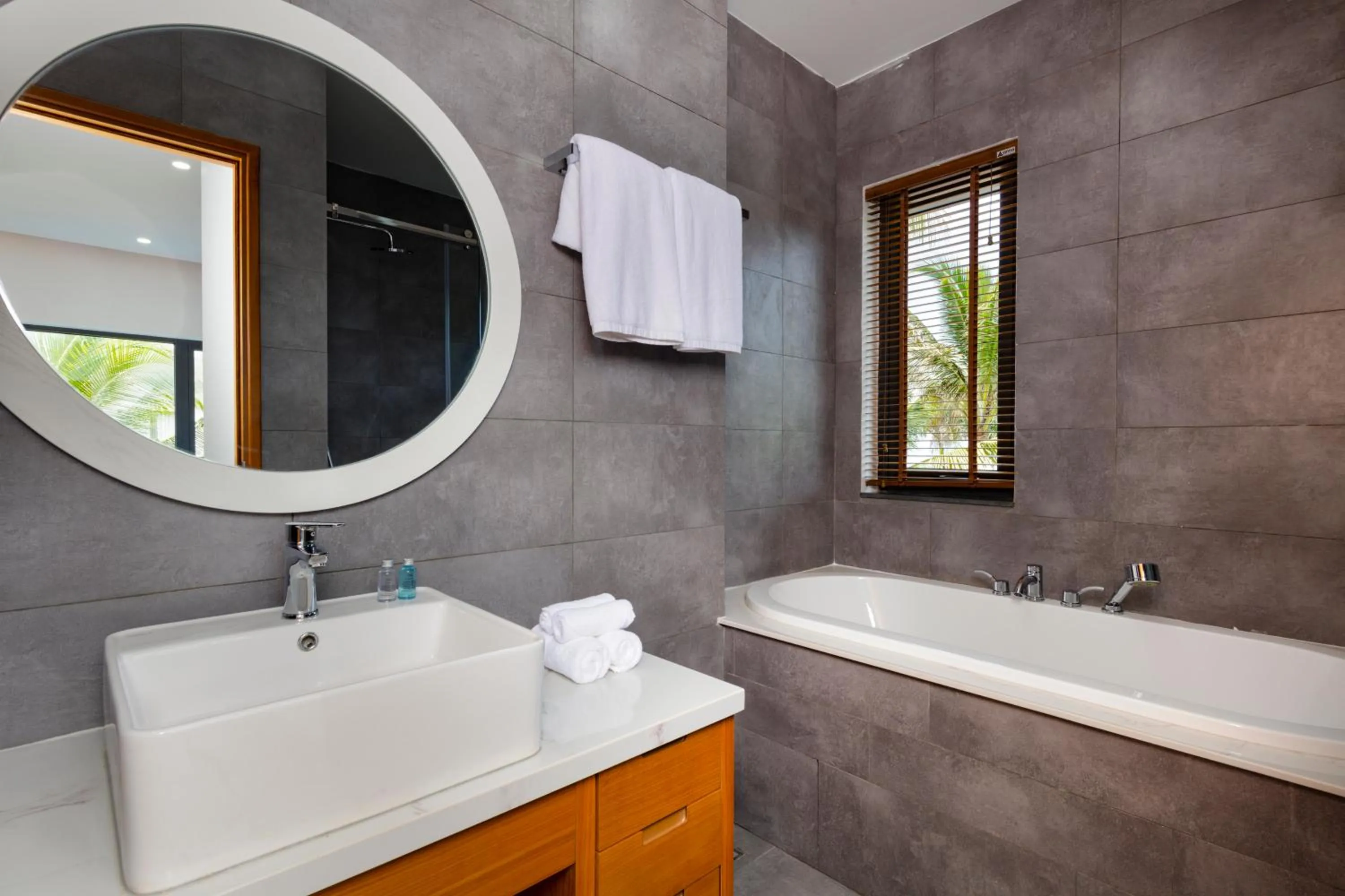 Bathroom in Le Palmier Ho Tram Resort - Beachfront with Private Beach