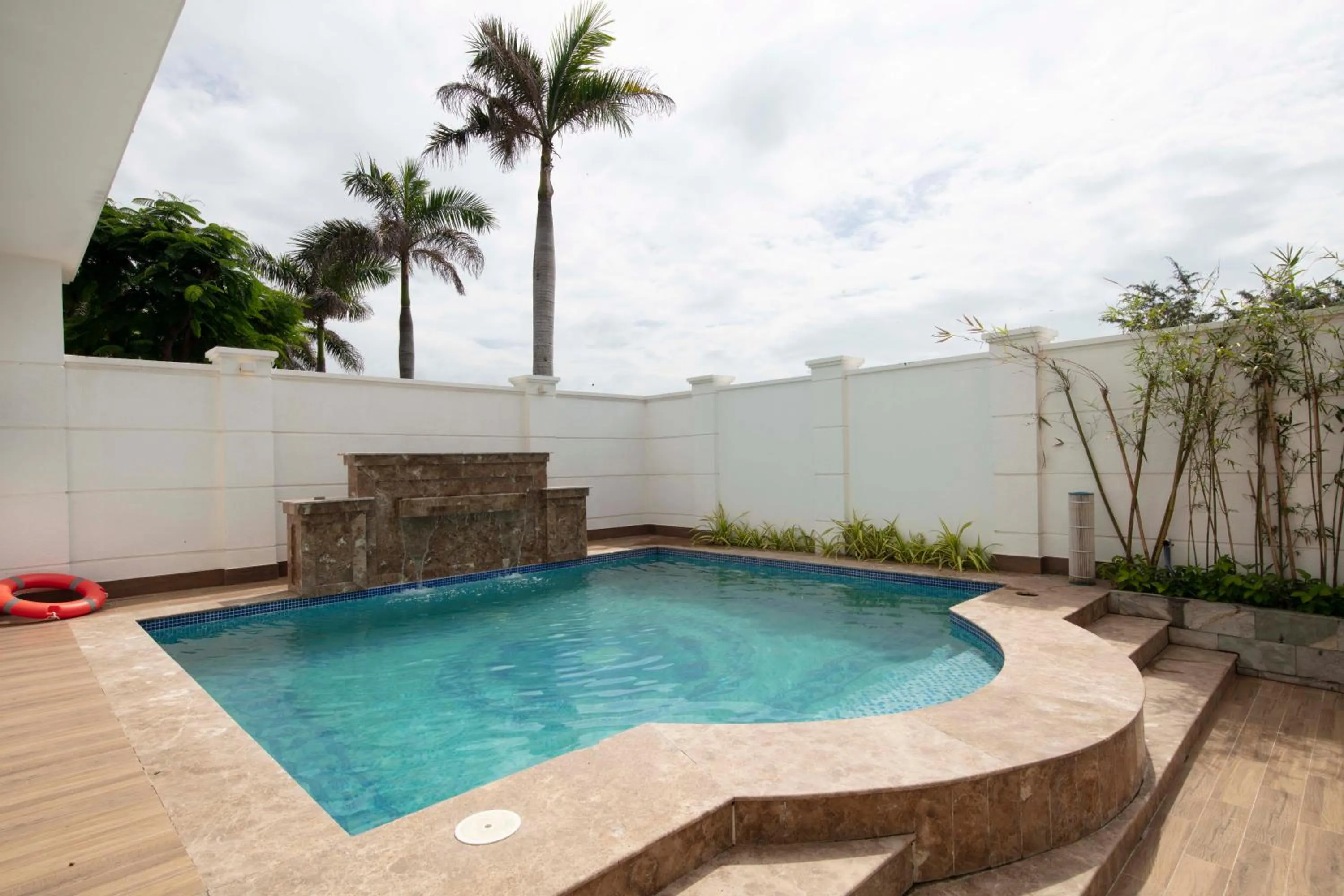 Swimming pool in Le Palmier Ho Tram Resort - Beachfront with Private Beach