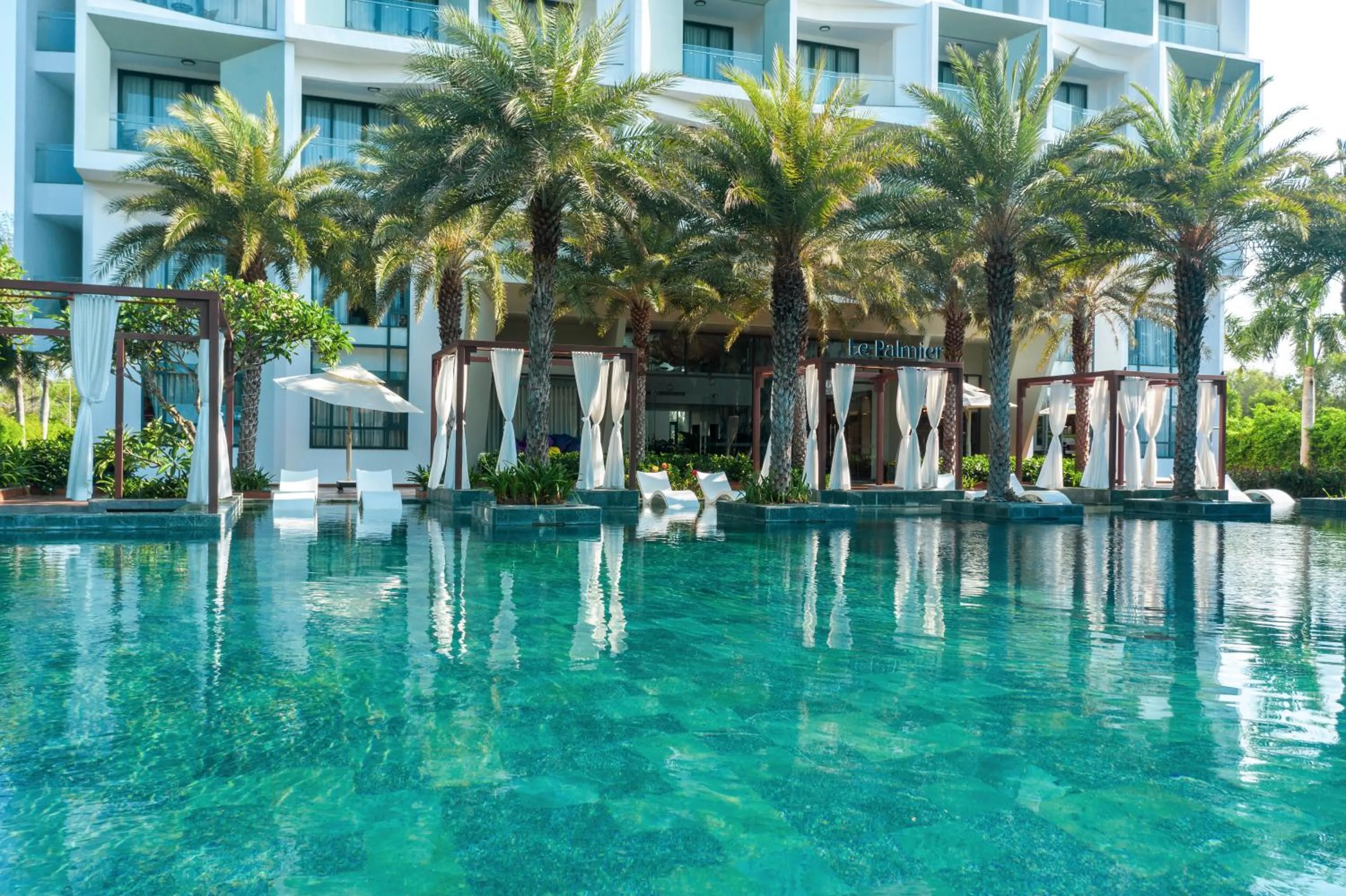 Swimming pool in Le Palmier Ho Tram Resort - Beachfront with Private Beach