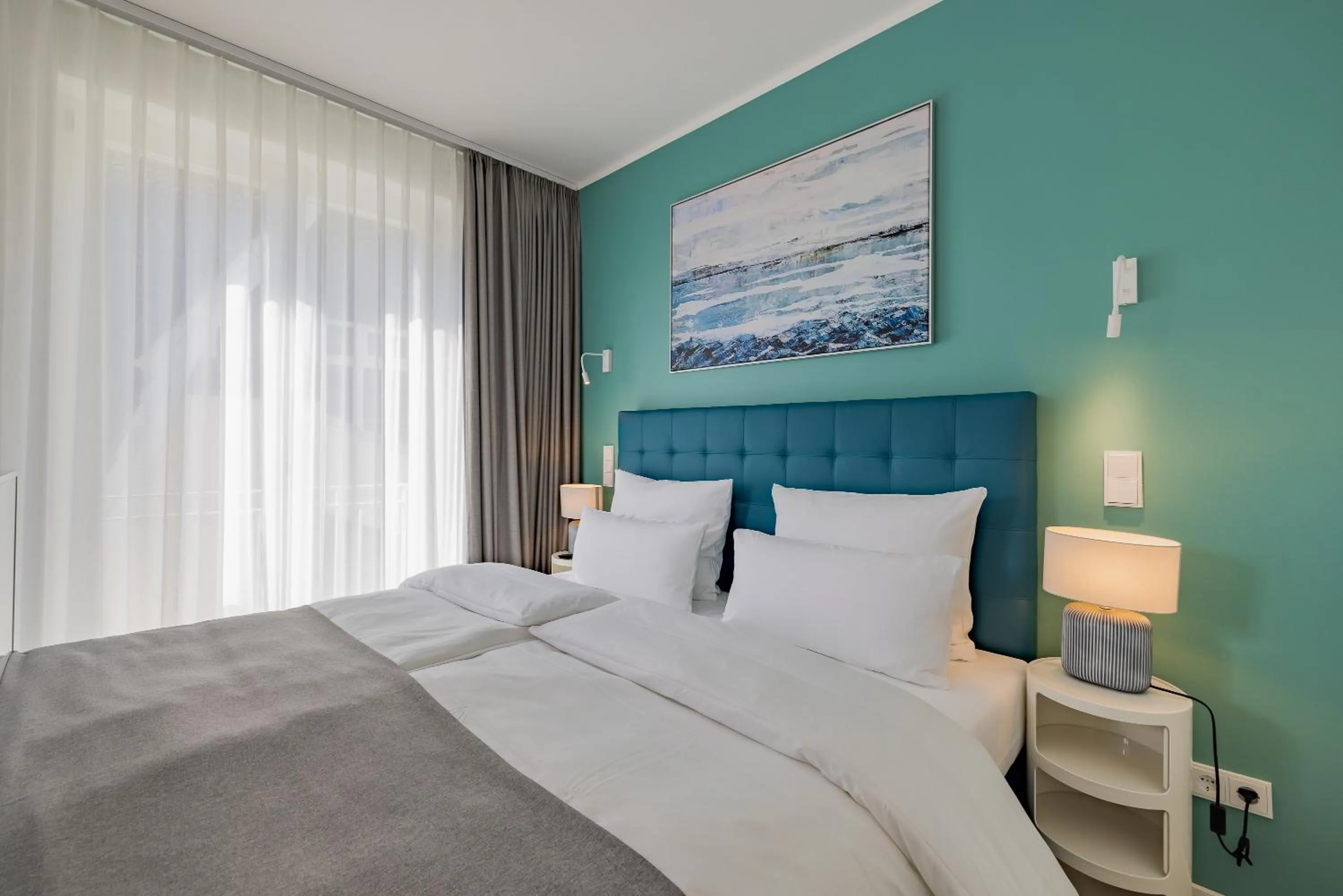 Bed in ATLANTIC Grand Hotel Travemünde