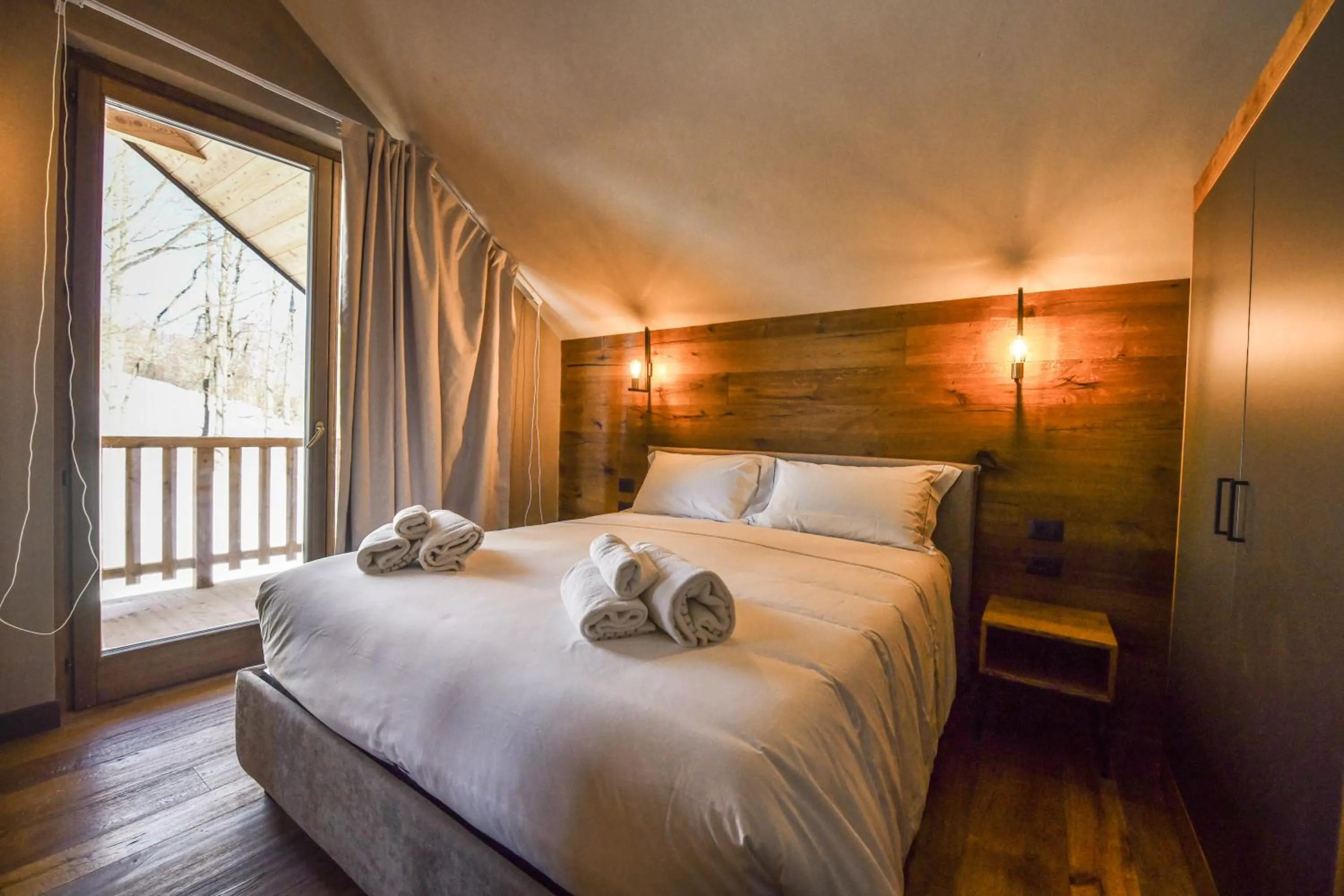 Bed in Chalet Everest - Luxury Apartments
