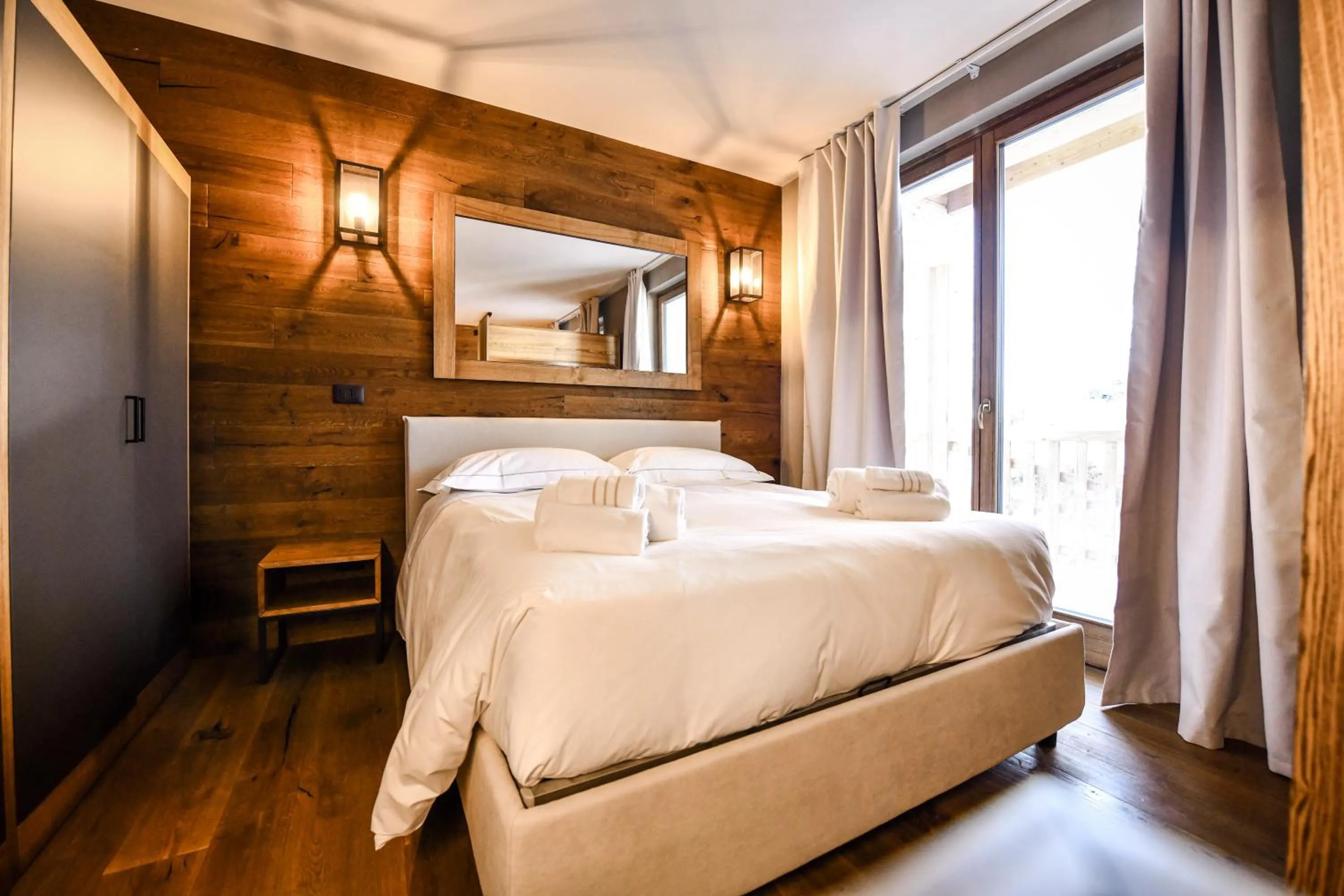 Bed in Chalet Everest - Luxury Apartments