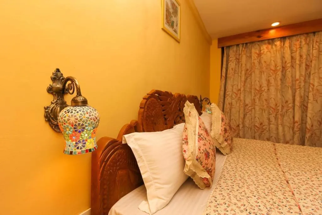Bed in Nandini Villa Dharamshala