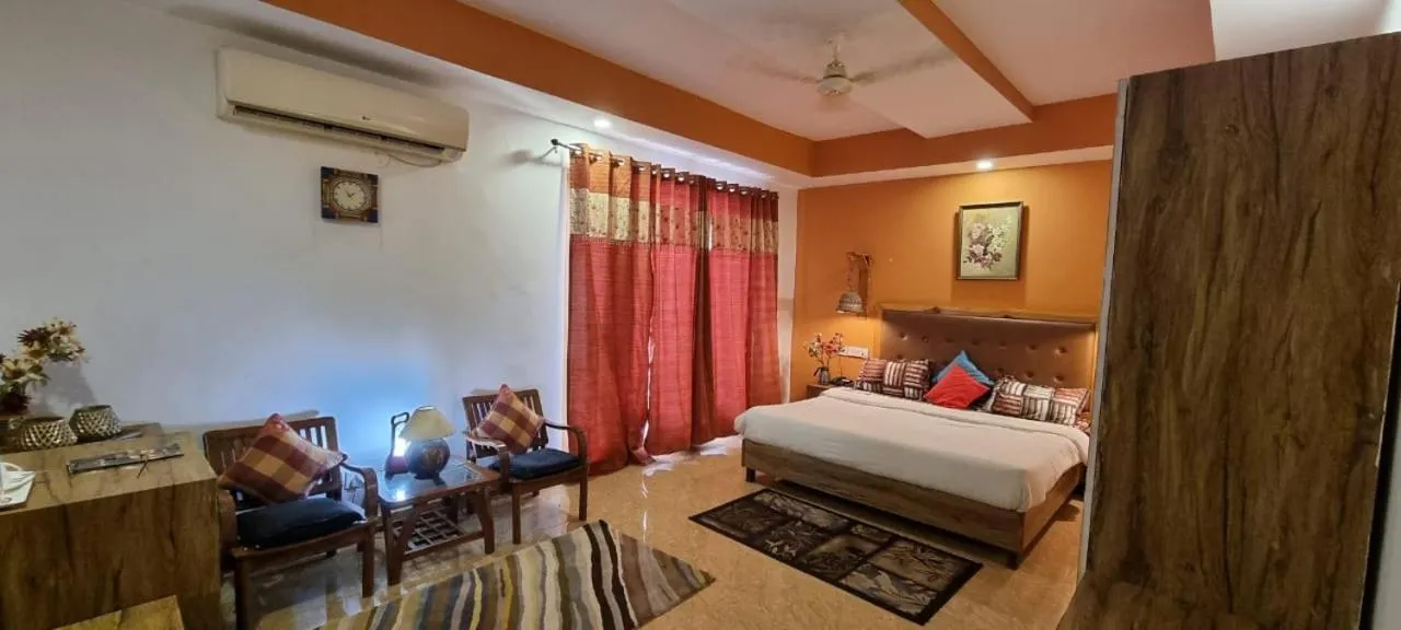 TV and multimedia, Bed in Nandini Villa Dharamshala