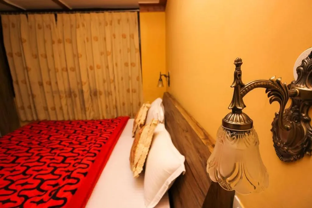Bed in Nandini Villa Dharamshala