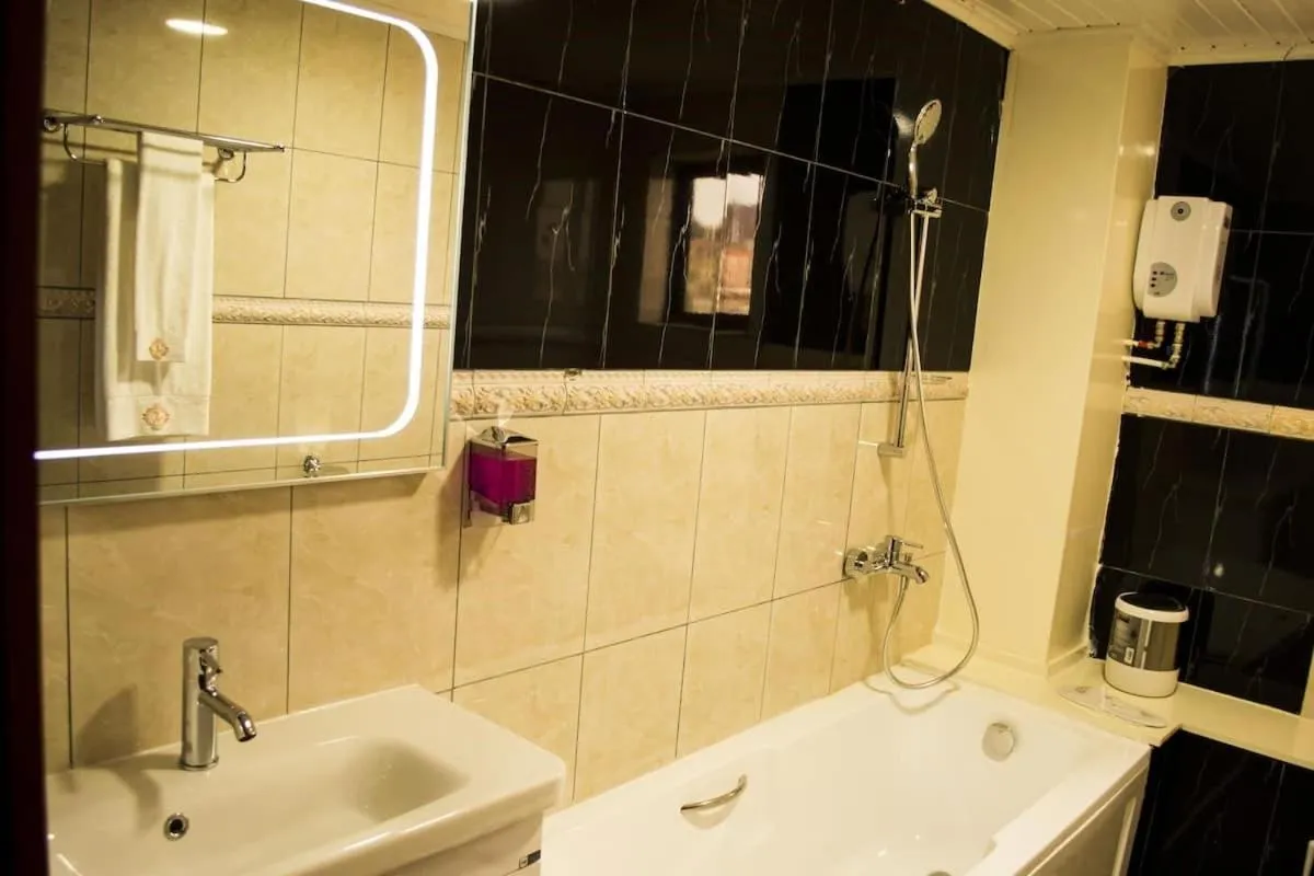 Bath in Hôtel Jouvence International