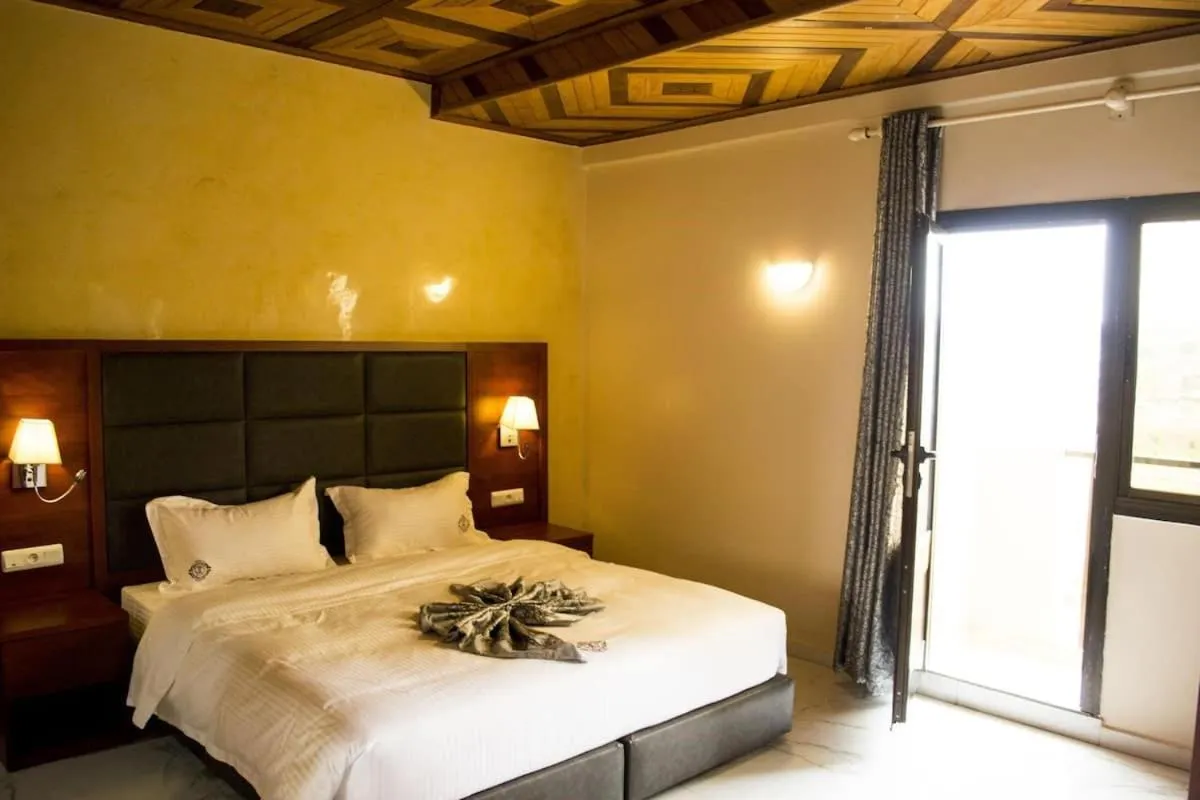 Bed in Hôtel Jouvence International