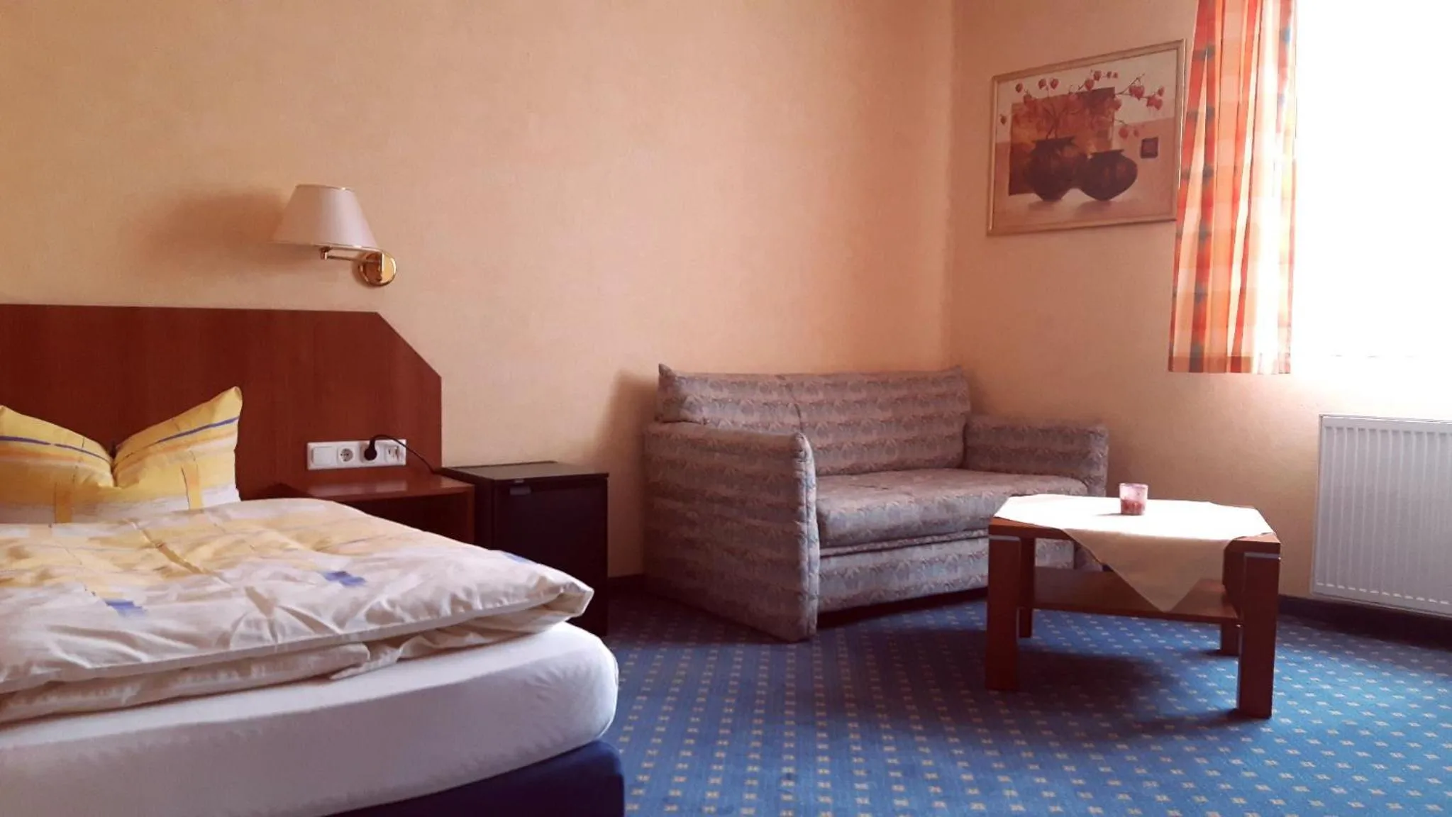 Seating area, Bed in Hotel Evabrunnen