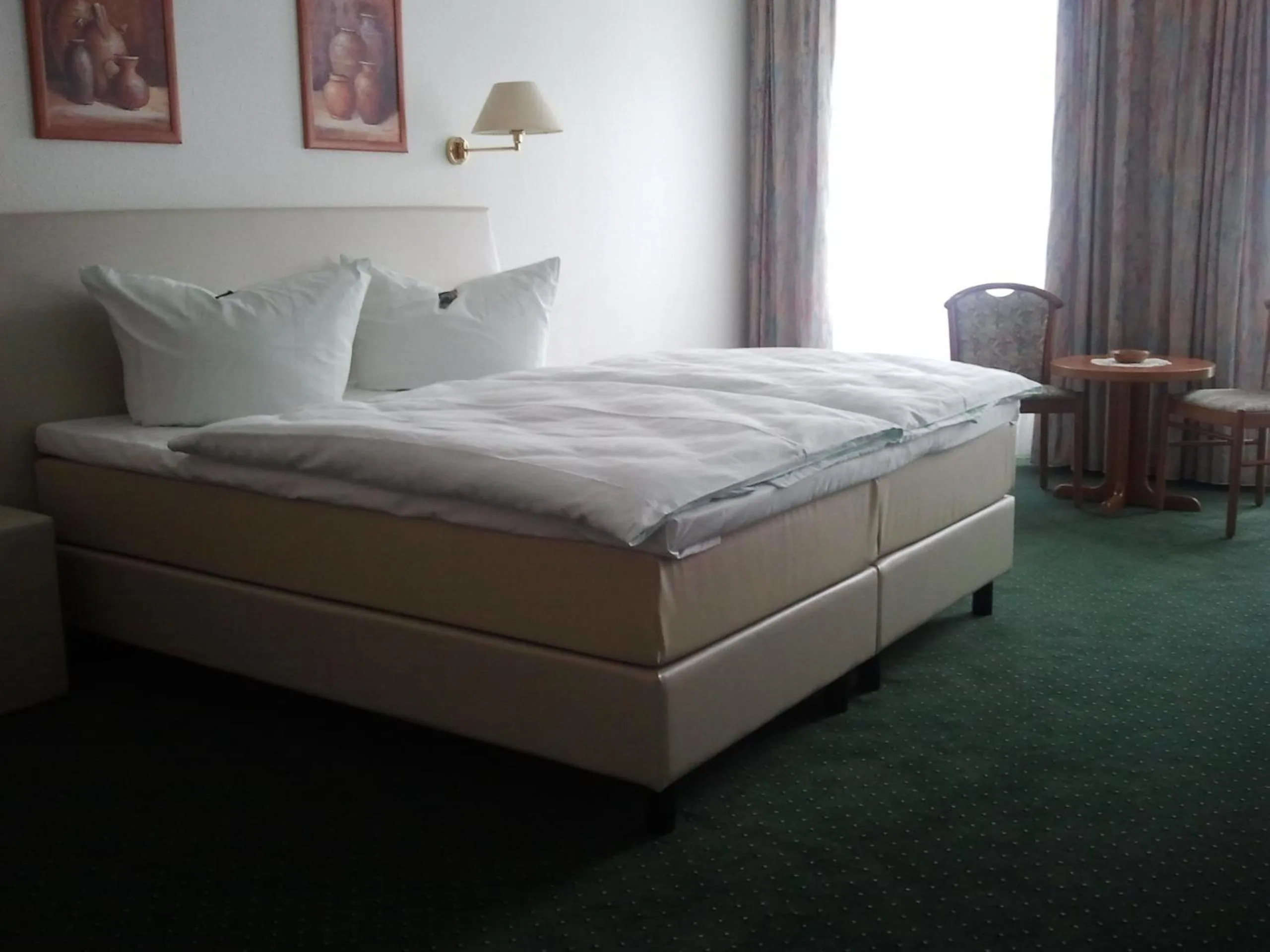 Photo of the whole room, Bed in Hotel Evabrunnen