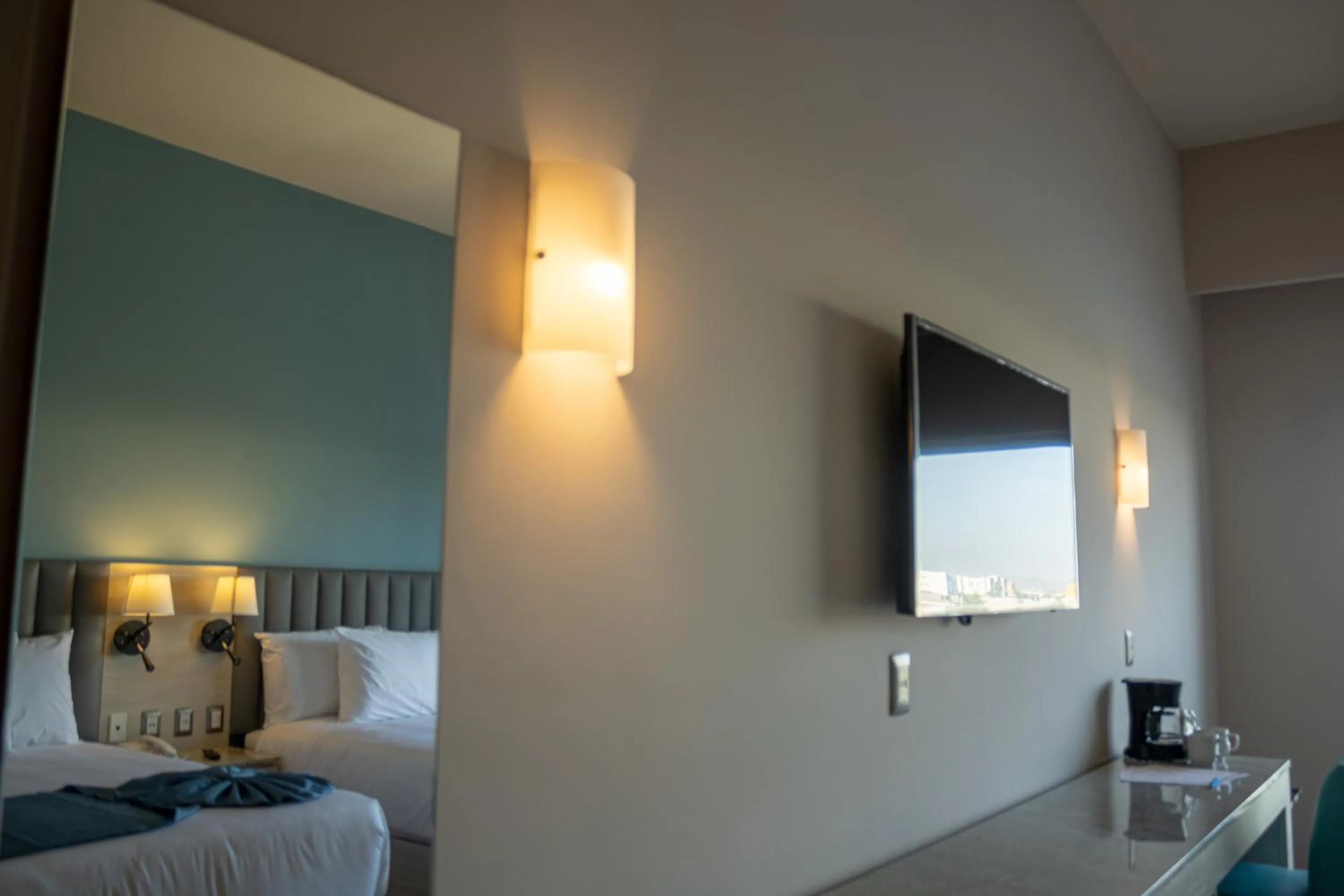 Bed in Varali Grand Hotel