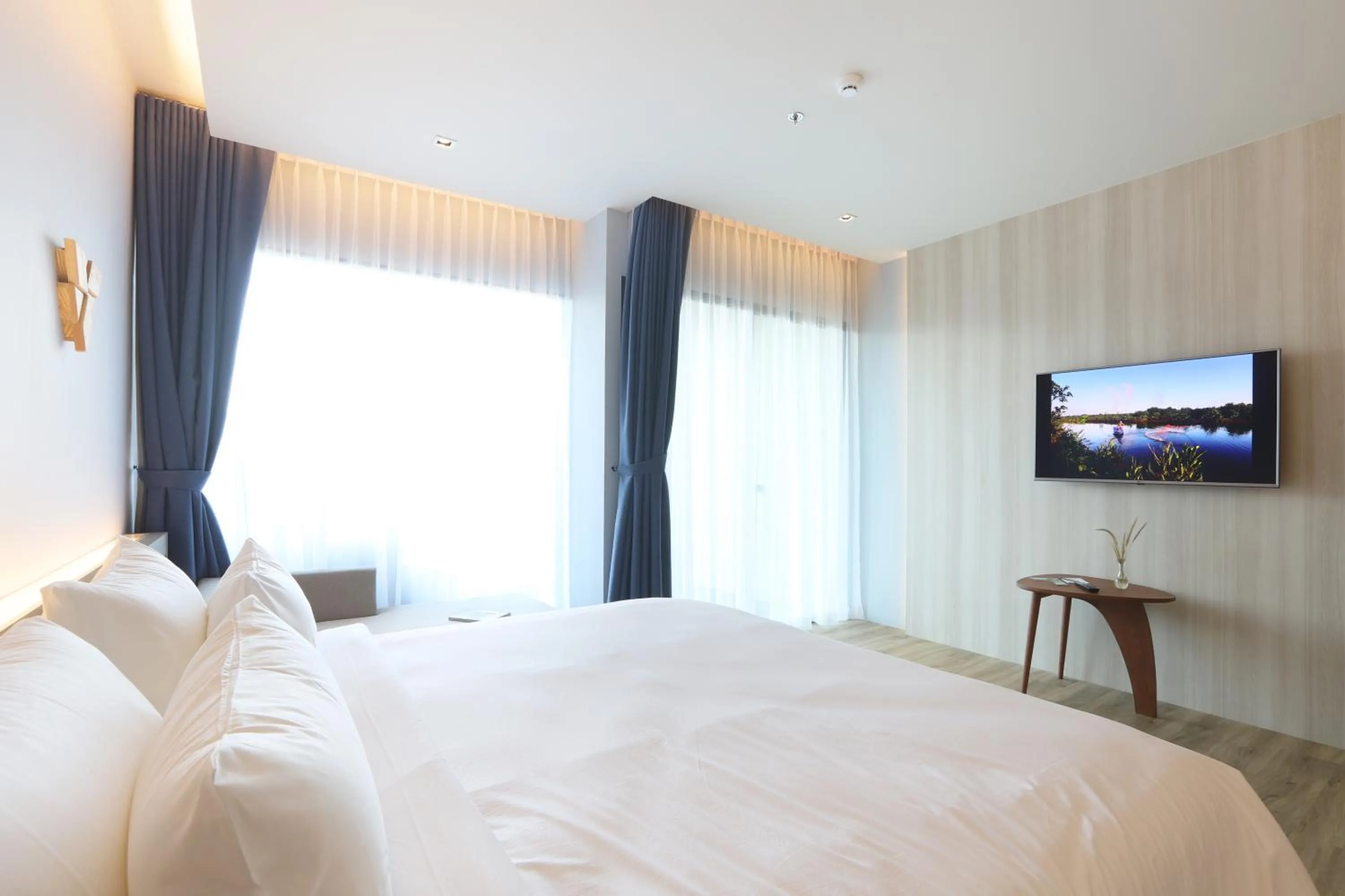 Bed in The Signature Hotel Airport