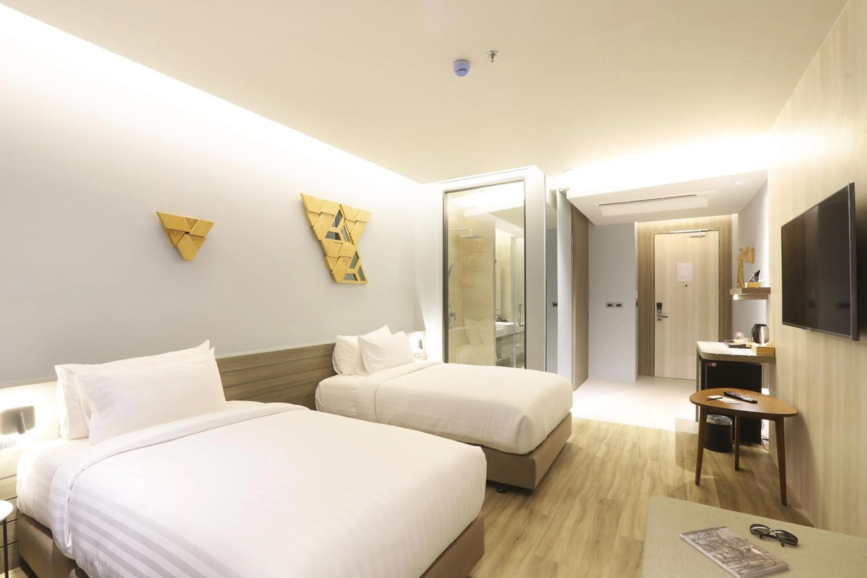 Bed in The Signature Hotel Airport