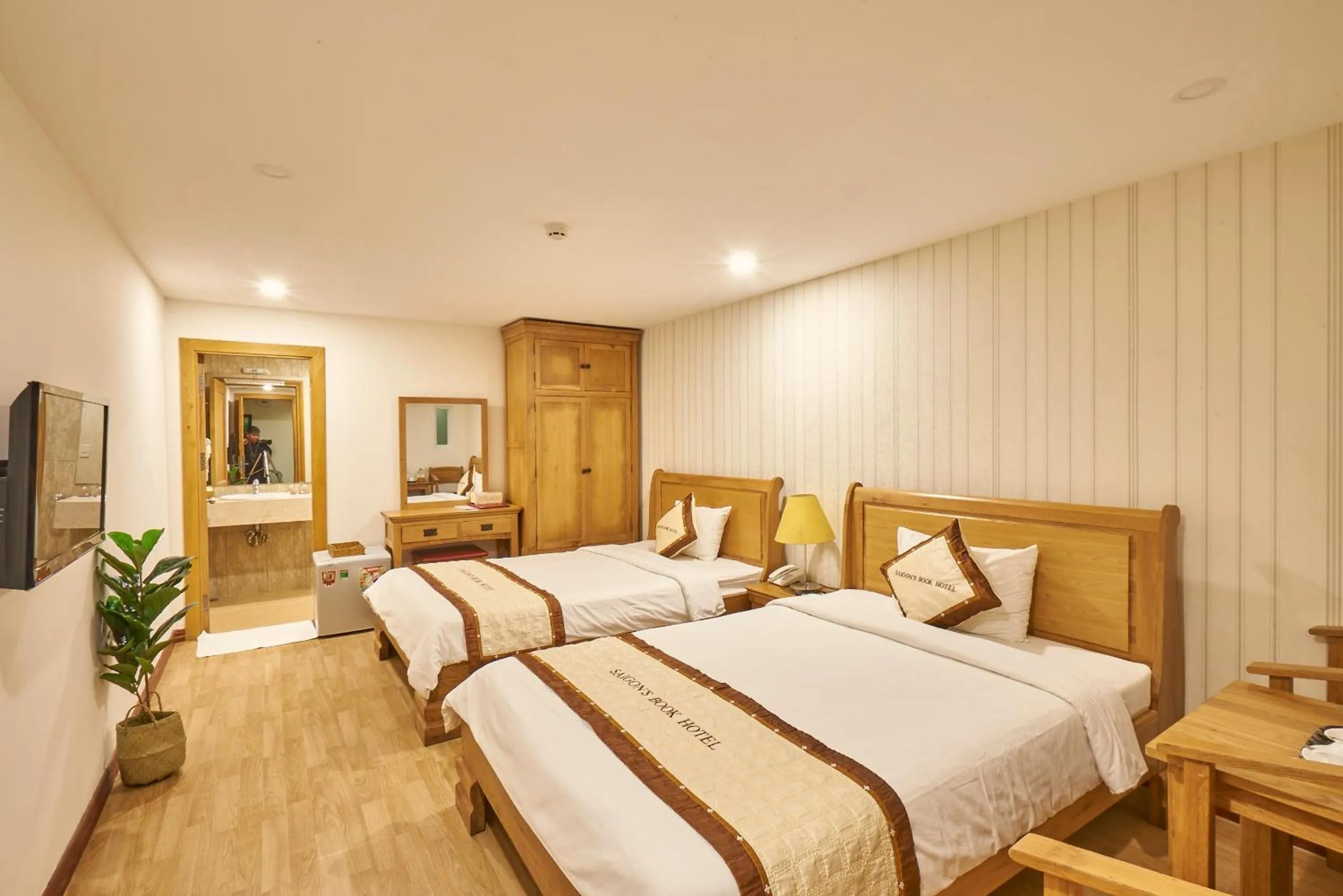 Photo of the whole room, Bed in Sai Gon's Book Hotel - The Airport Front