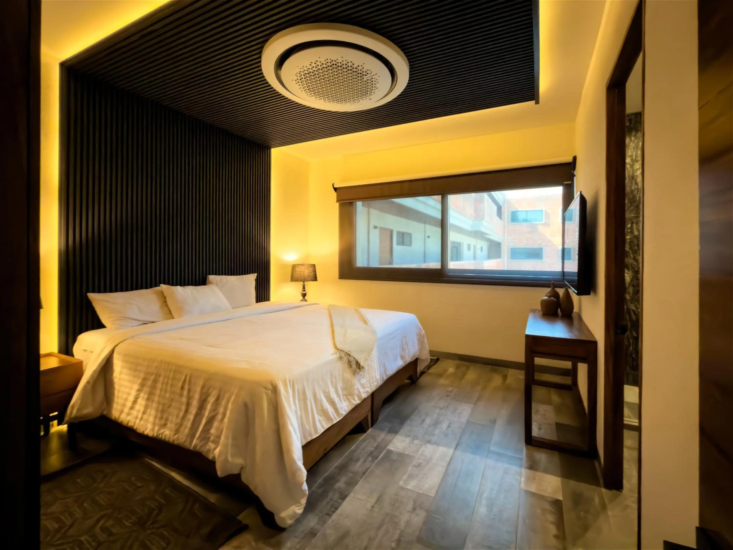 Bed in Nimue Marina Residence