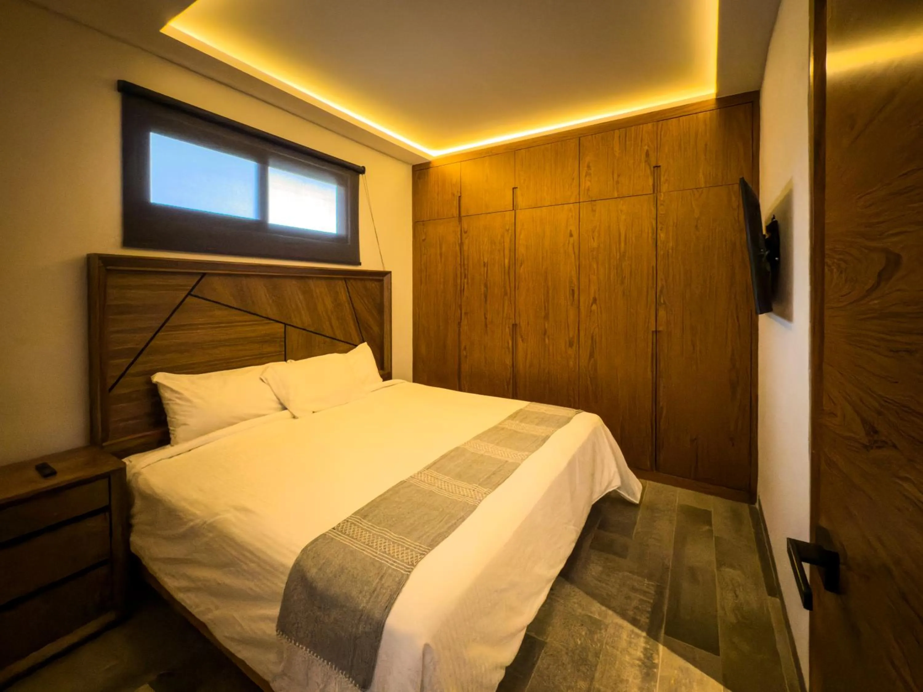 Bed in Nimue Marina Residence