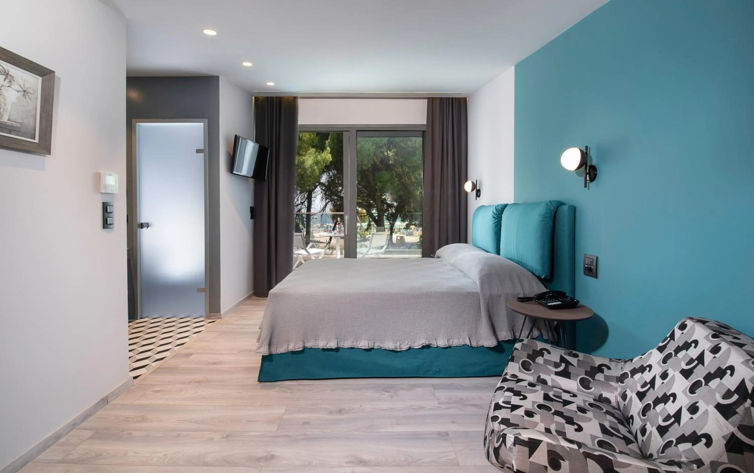 Photo of the whole room in Lagomandra Luxury Suites with Private Pools