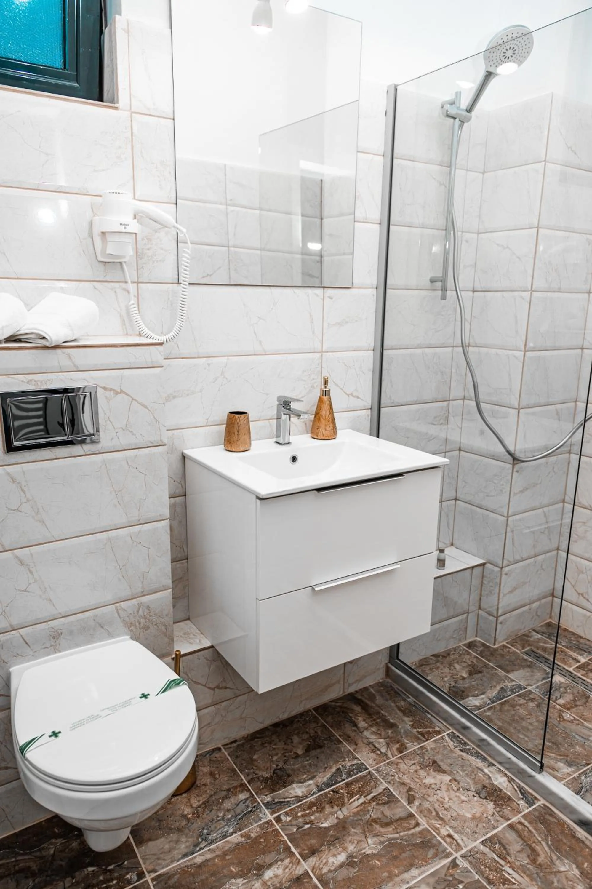 Shower in Puzzle Apartaments&Studios