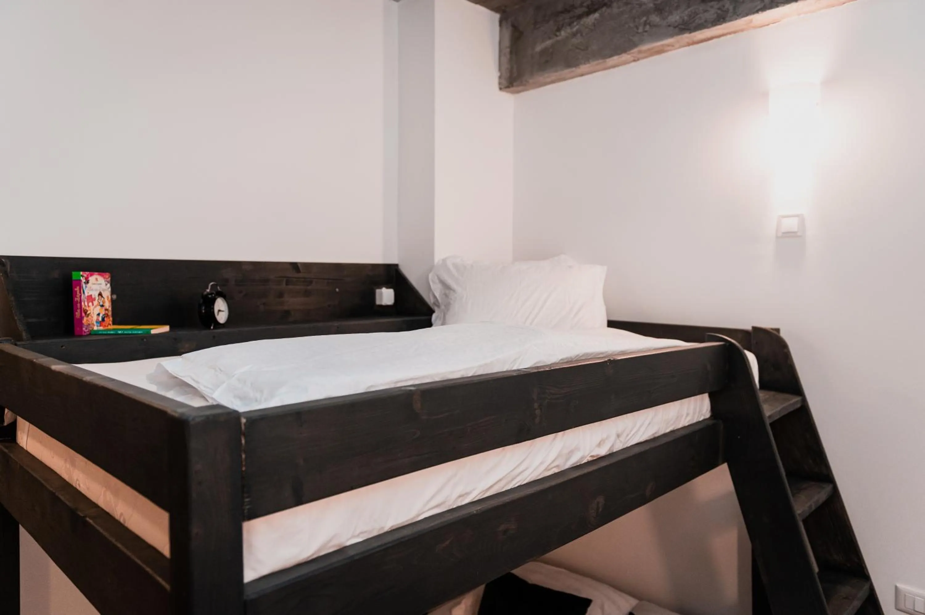 Bed in Puzzle Apartaments&Studios