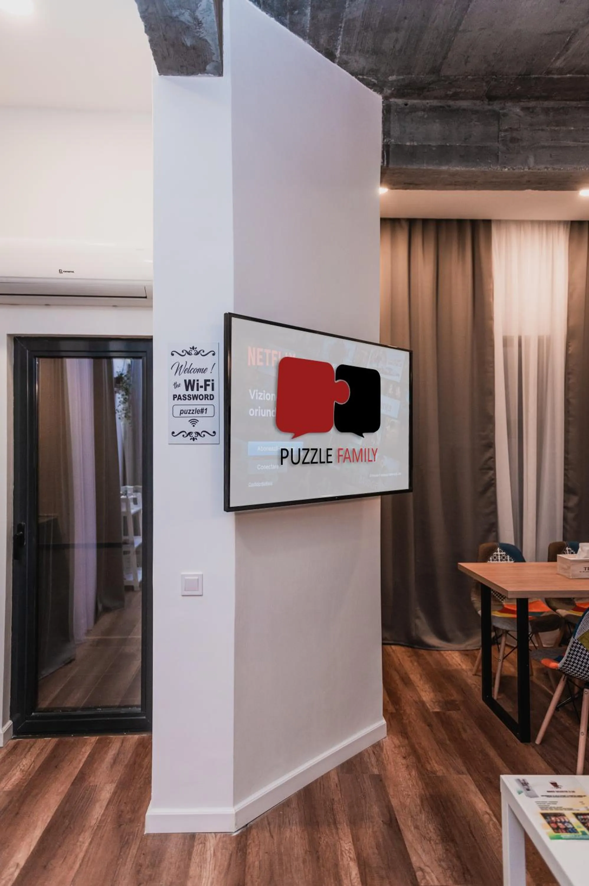 TV and multimedia in Puzzle Apartaments&Studios