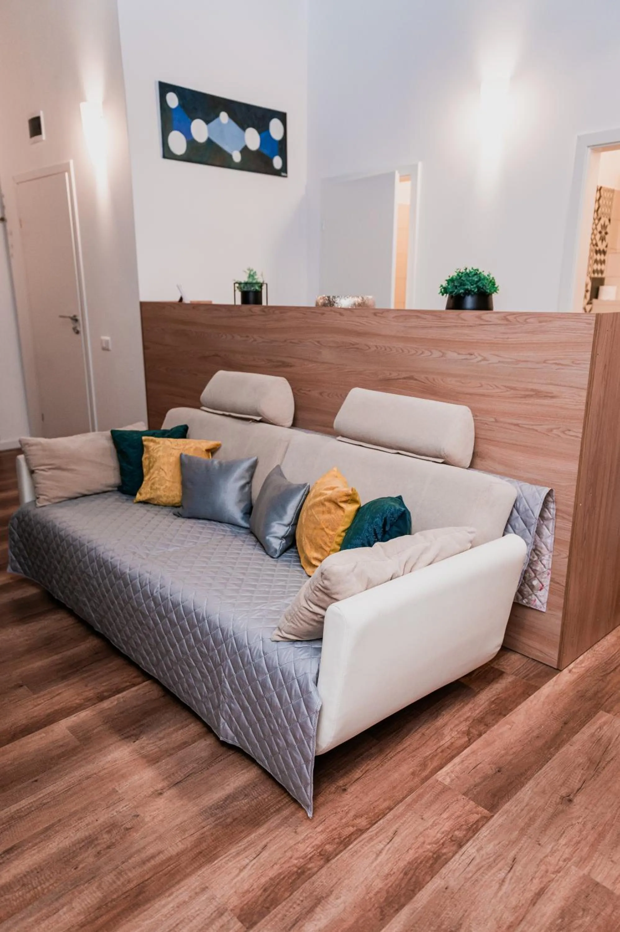 Seating area, Bed in Puzzle Apartaments&Studios