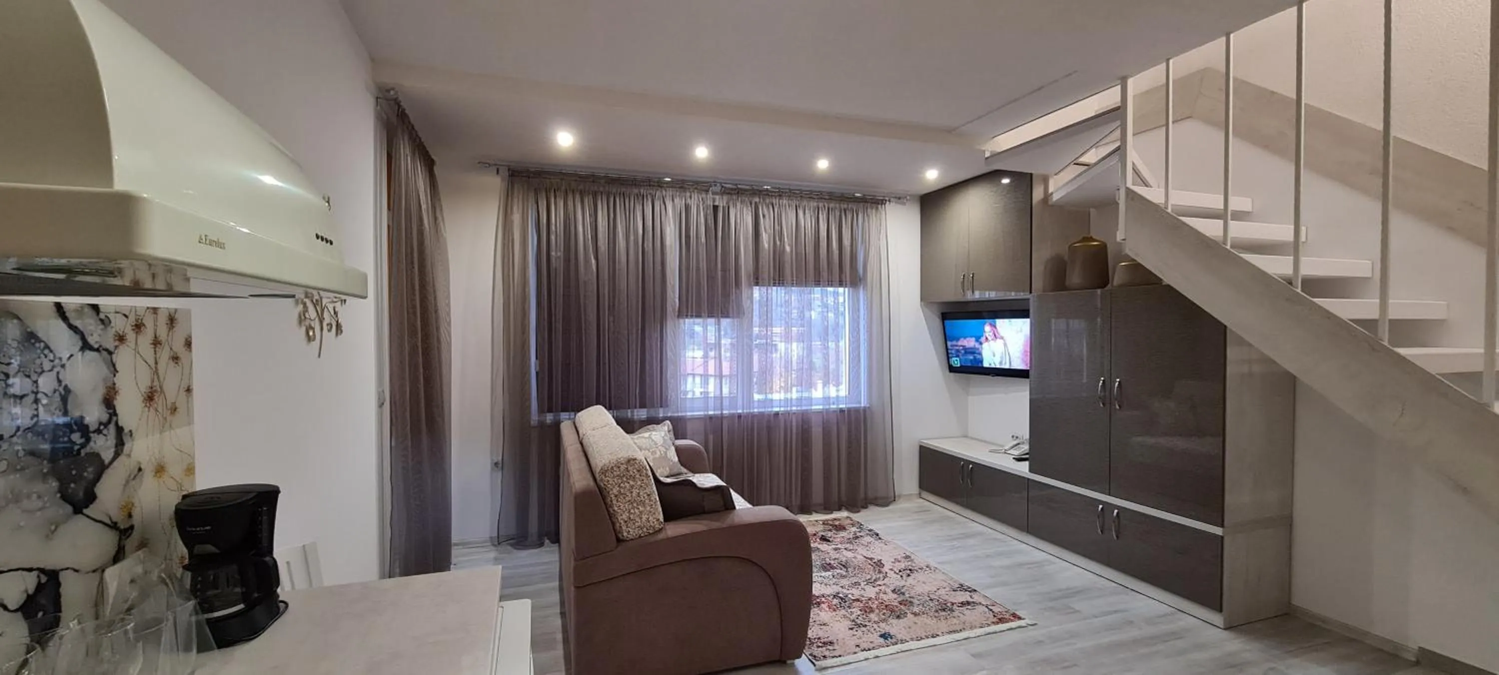 Communal lounge/ TV room in Aparthotel Olympus Plaza - SPA & Indoor Pool