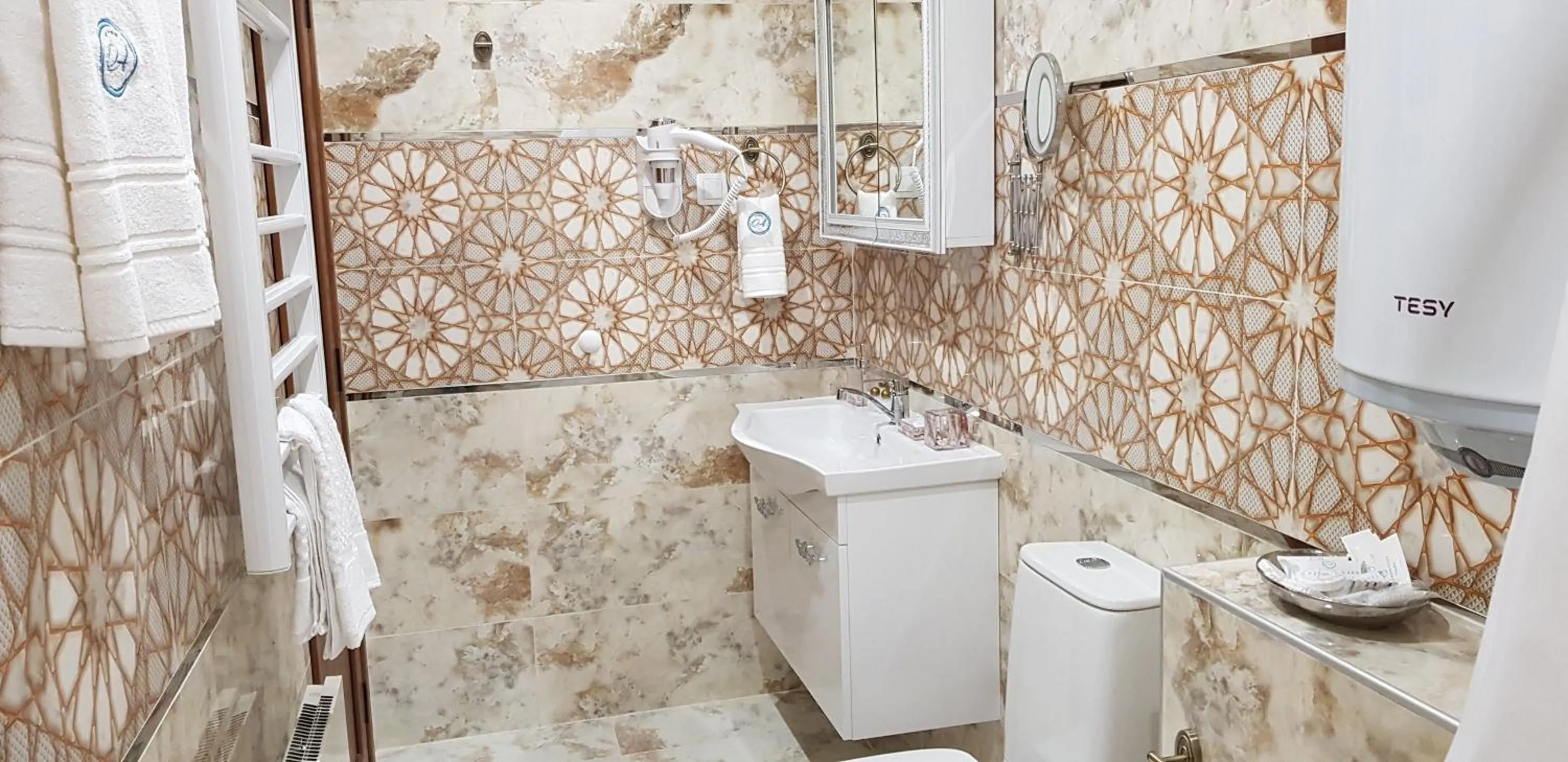 Bathroom in Aparthotel Olympus Plaza - SPA & Indoor Pool