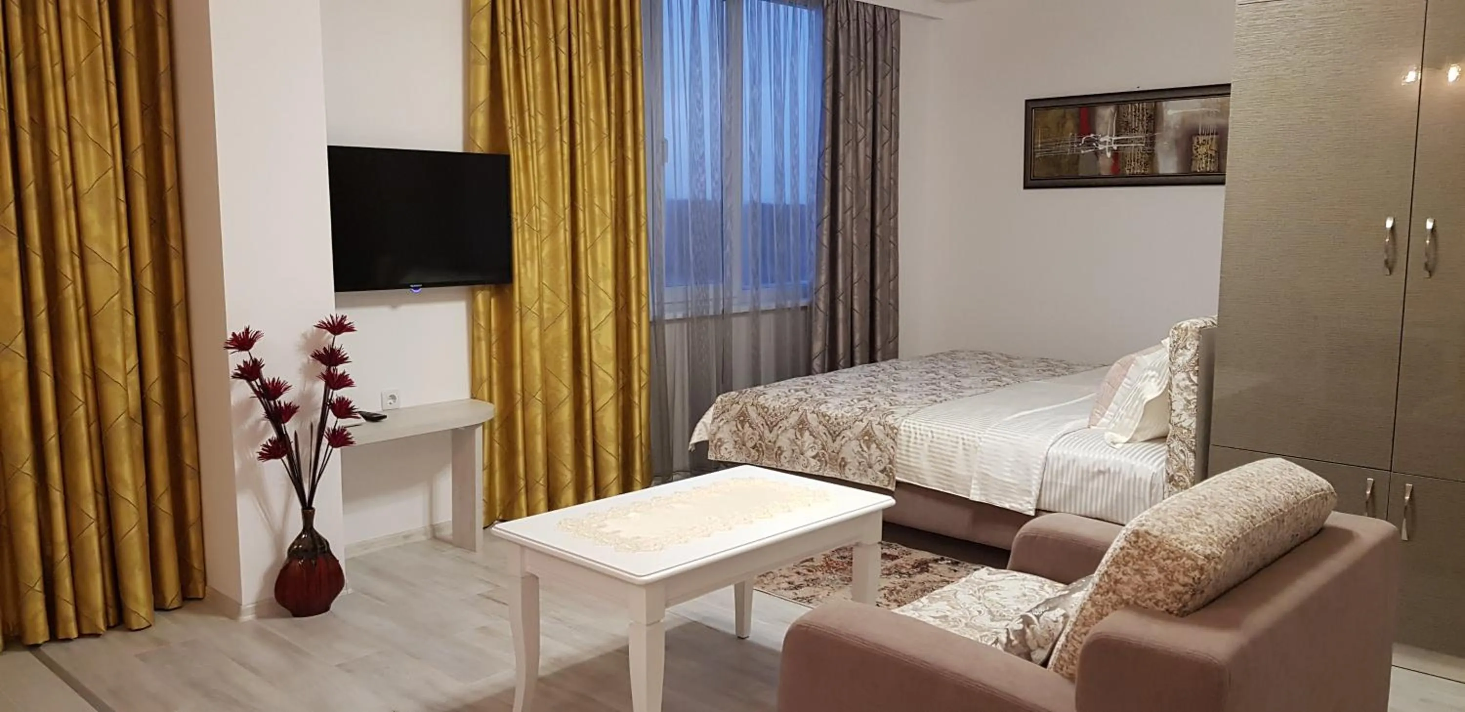 Communal lounge/ TV room, Bed in Aparthotel Olympus Plaza - SPA & Indoor Pool