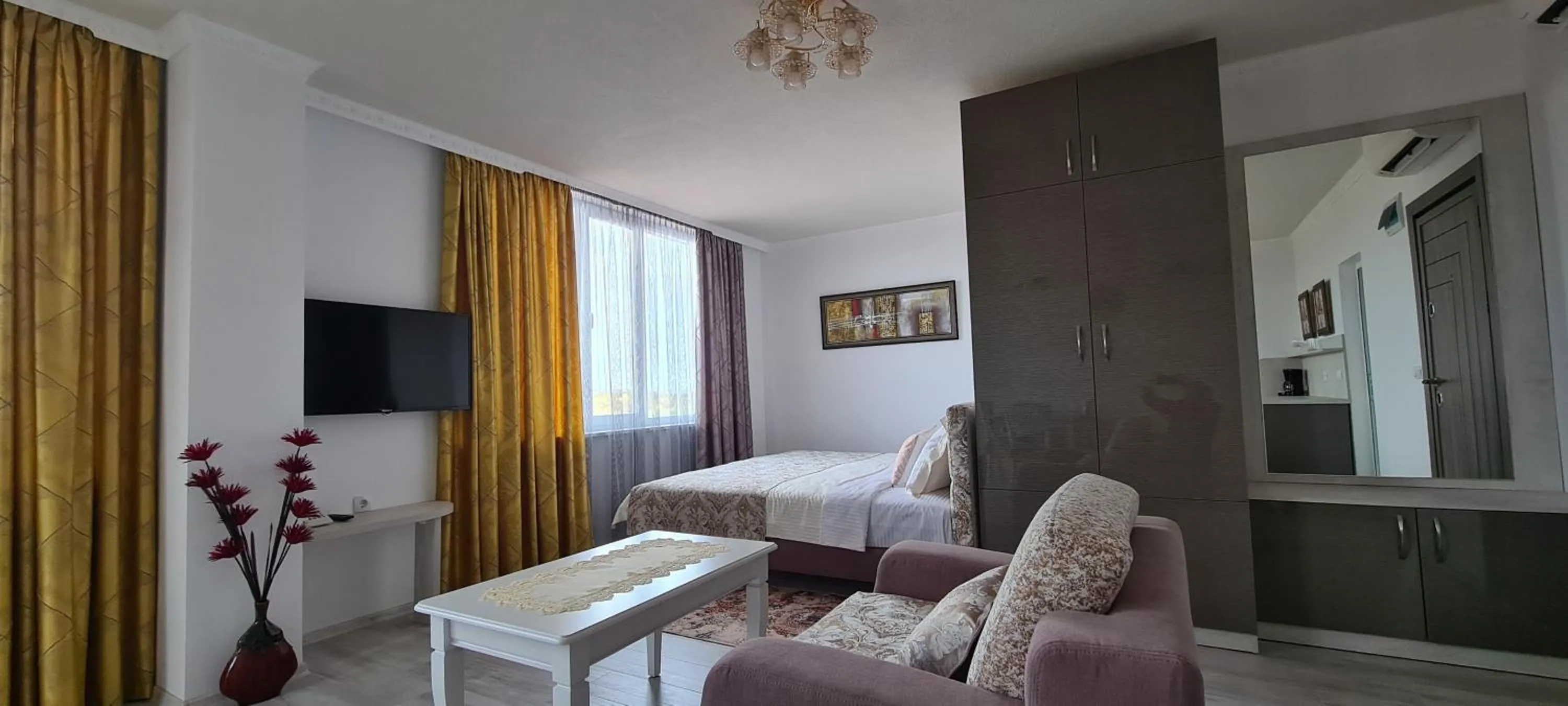 Communal lounge/ TV room, Bed in Aparthotel Olympus Plaza - SPA & Indoor Pool