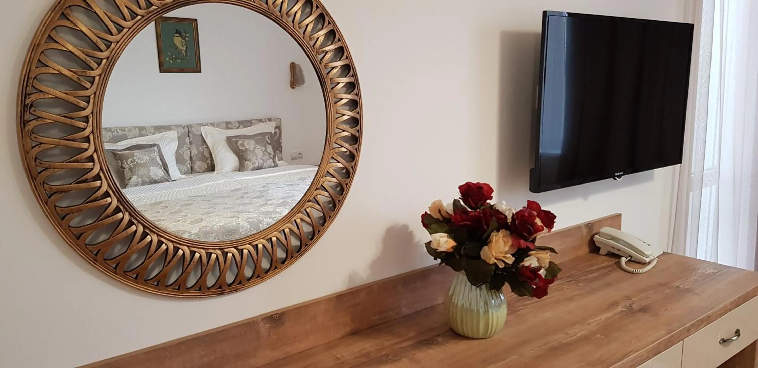 TV and multimedia in Aparthotel Olympus Plaza - SPA & Indoor Pool