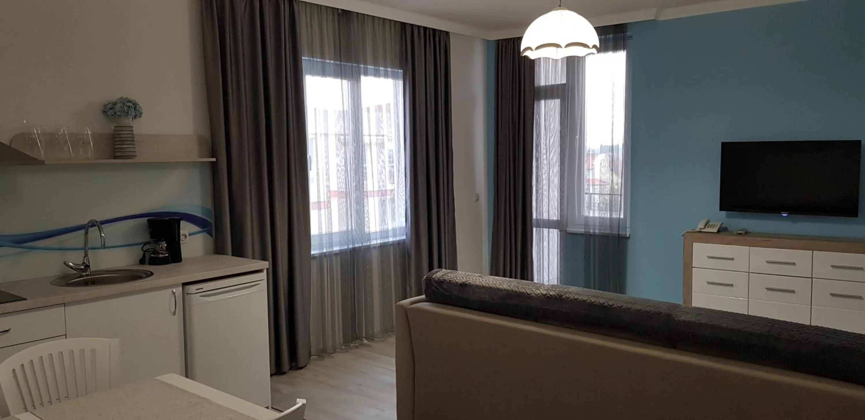 Communal lounge/ TV room in Aparthotel Olympus Plaza - SPA & Indoor Pool