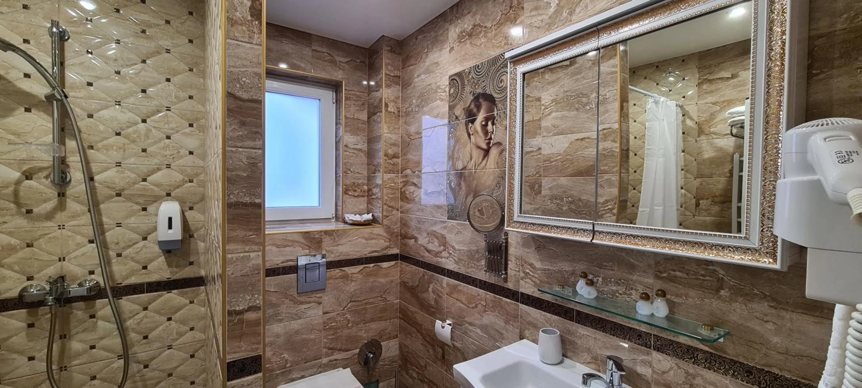 Bathroom in Aparthotel Olympus Plaza - SPA & Indoor Pool